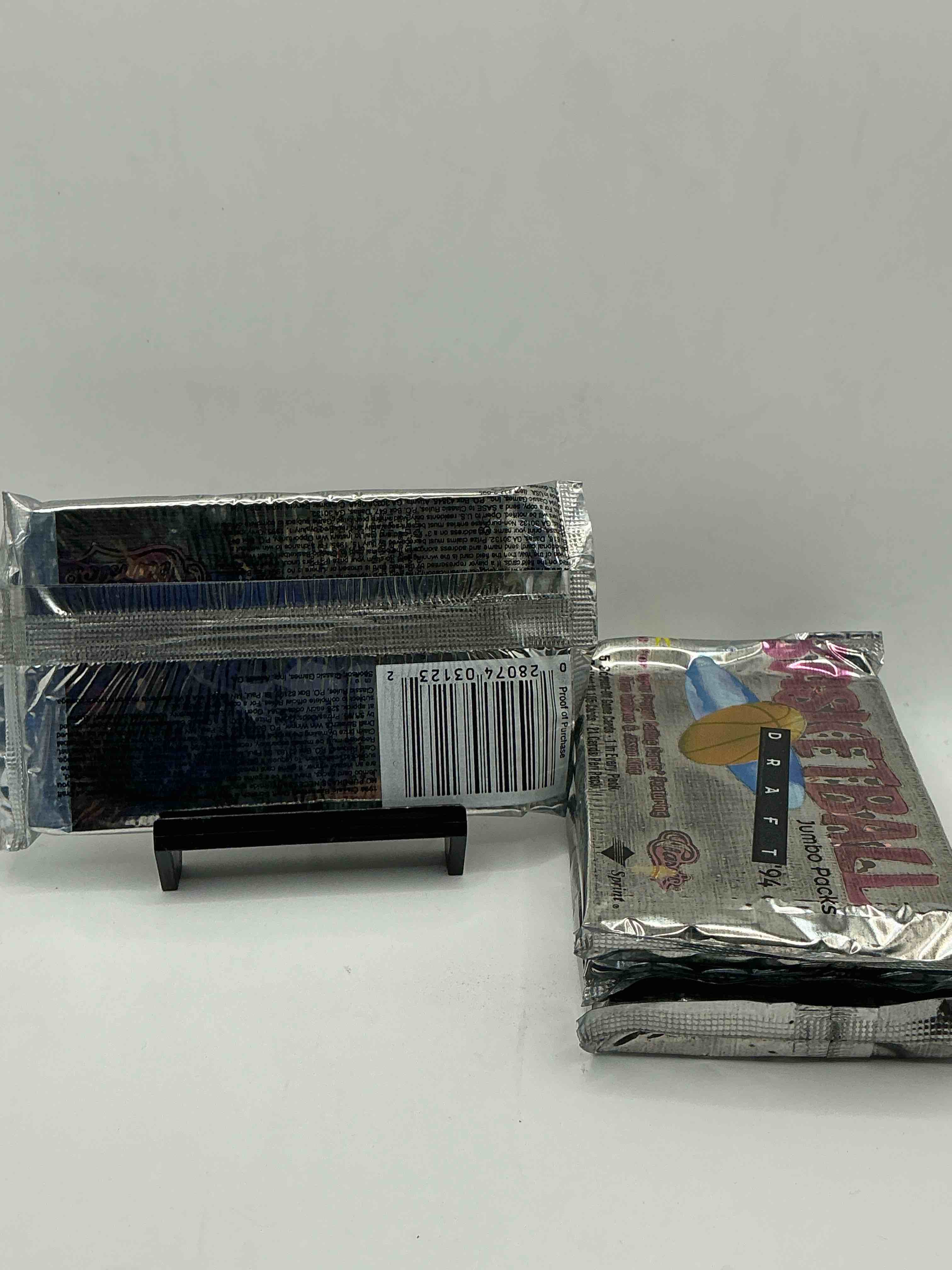 Condition photo showing New/Like New for 1994 classic draft picks unopened basketball jumbo packs! search for jason kidd & grant hill rookies, along with other big names from the year! look for exclusive illustrated cards & numbered cards too!
