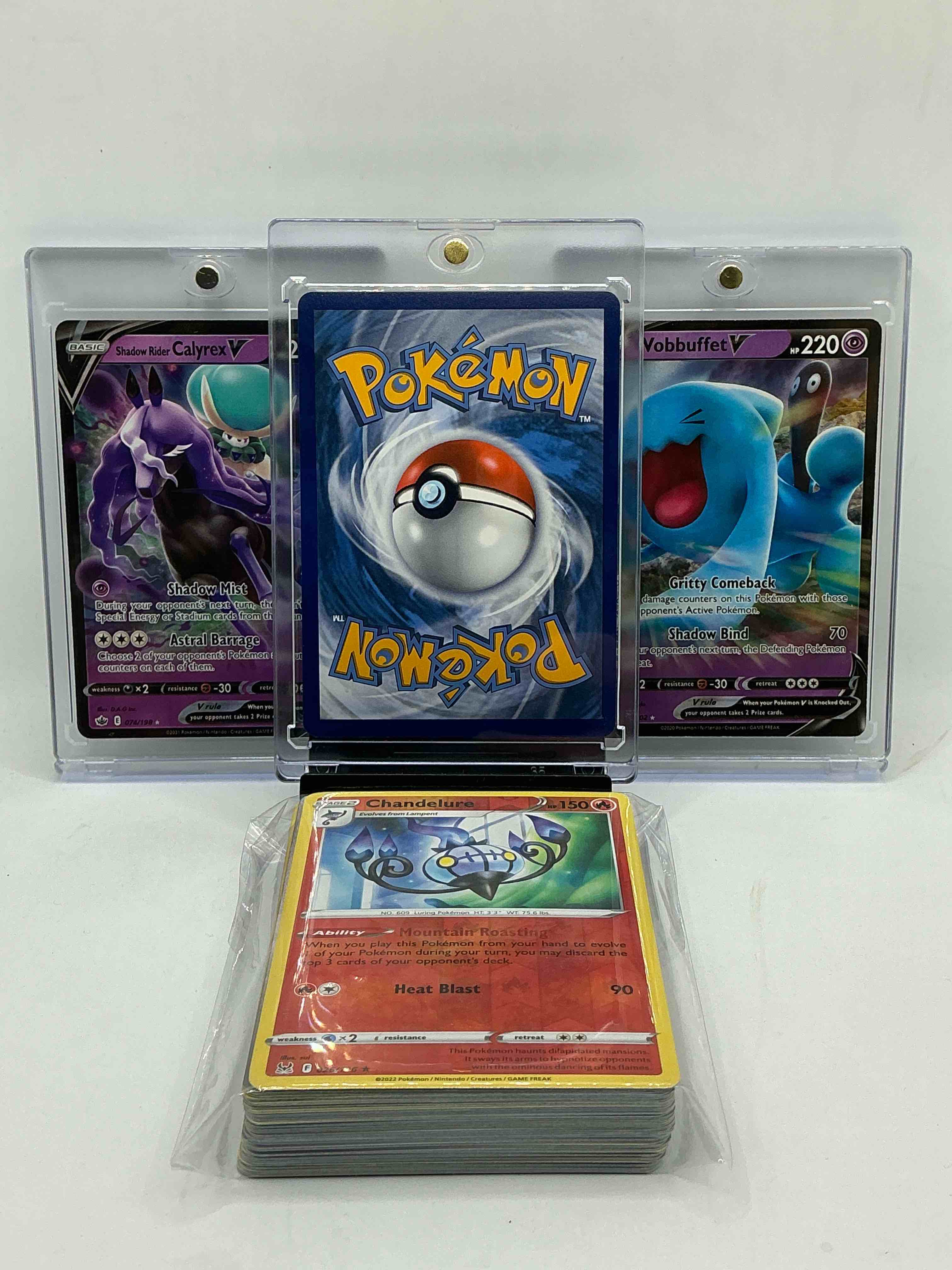 Condition photo showing New/Like New for pikachu v! shadow rider calyrex v! wobbuffet v! along with 50 other pokémon heroes, holos, legends & commons- including holographic cards, stage 2 cards, holos in all forms & more! also includes 36 non holo common/ uncommon basic & first stage cards trainers & energy too! perfect set for collectors & enthusiasts!