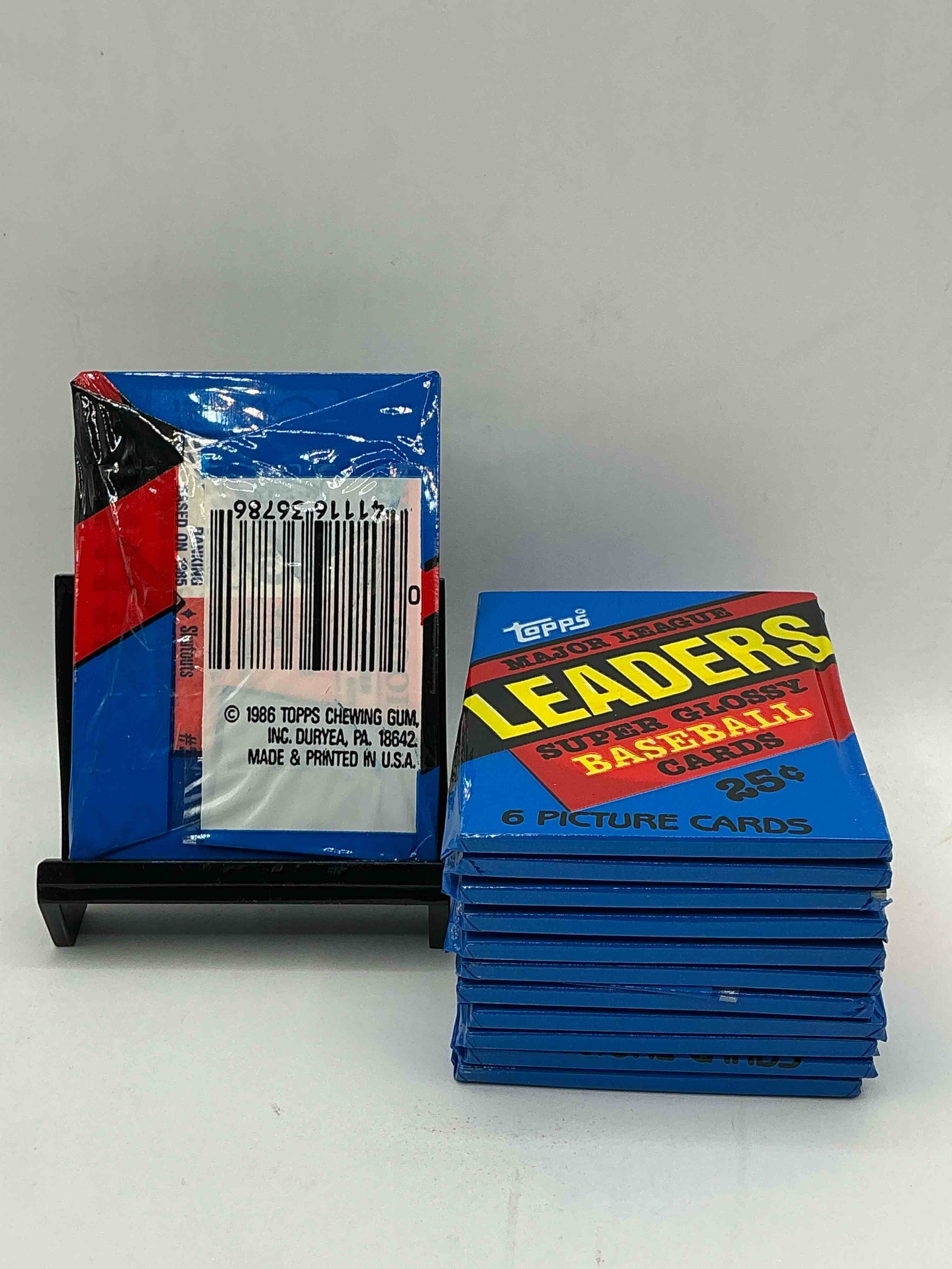 Condition photo showing New/Like New for ultra rare! 1986 "mlb leaders" unopened miniature baseball collectible card packs, 6 cards per pack, direct from original retail case. super rare, impossible to find! like new condition!