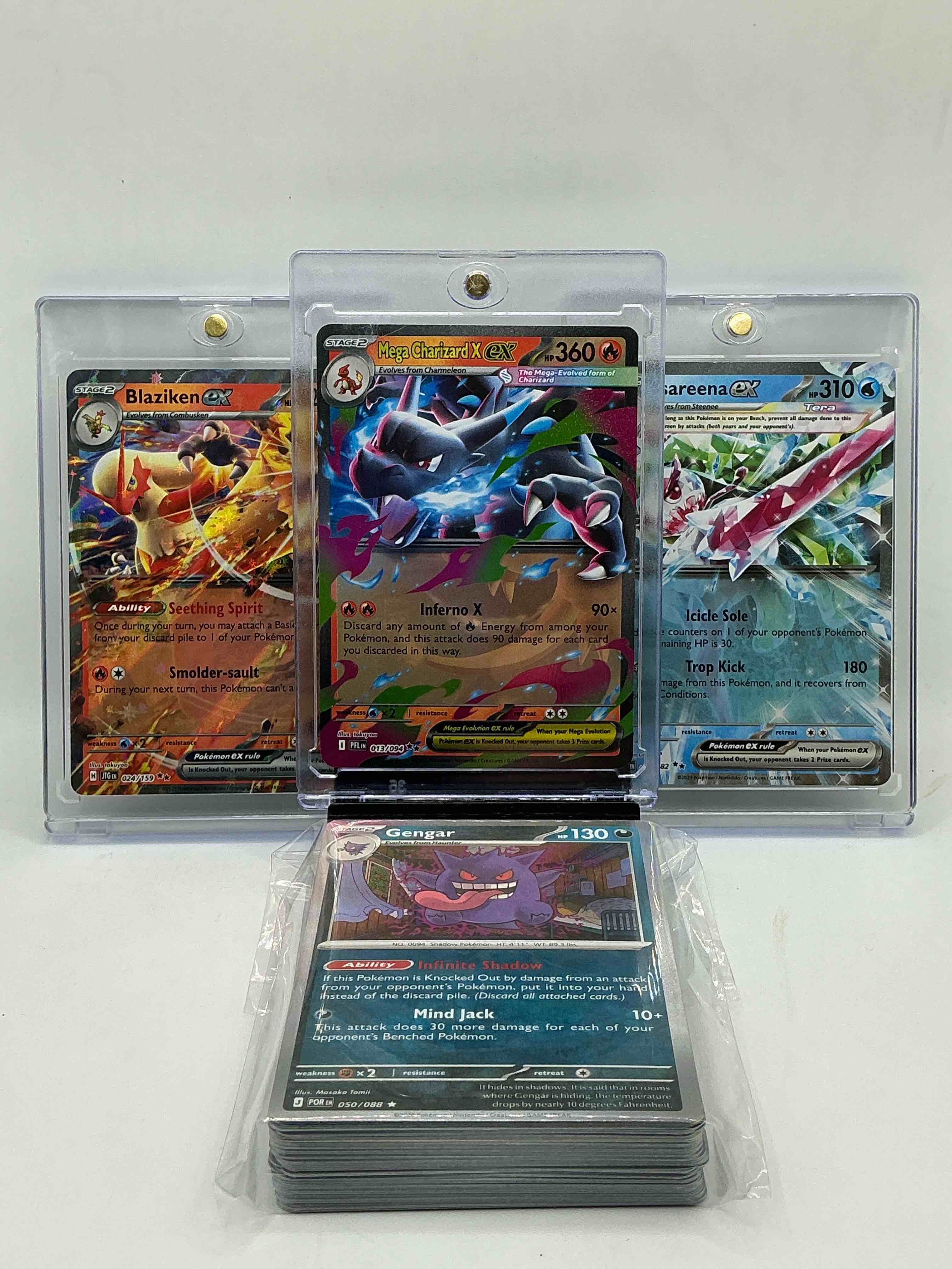 pokémon palooza! mega charizard x ex! blaziken ex! tsareena ex!  along with 50 other pokémon heroes, holos, legends & commons- including holographic cards, stage 2 cards, holos in all forms & more! also includes 36 non holo common/ uncommon basic & first stage cards trainers & energy too! perfect set for collectors & enthusiasts!