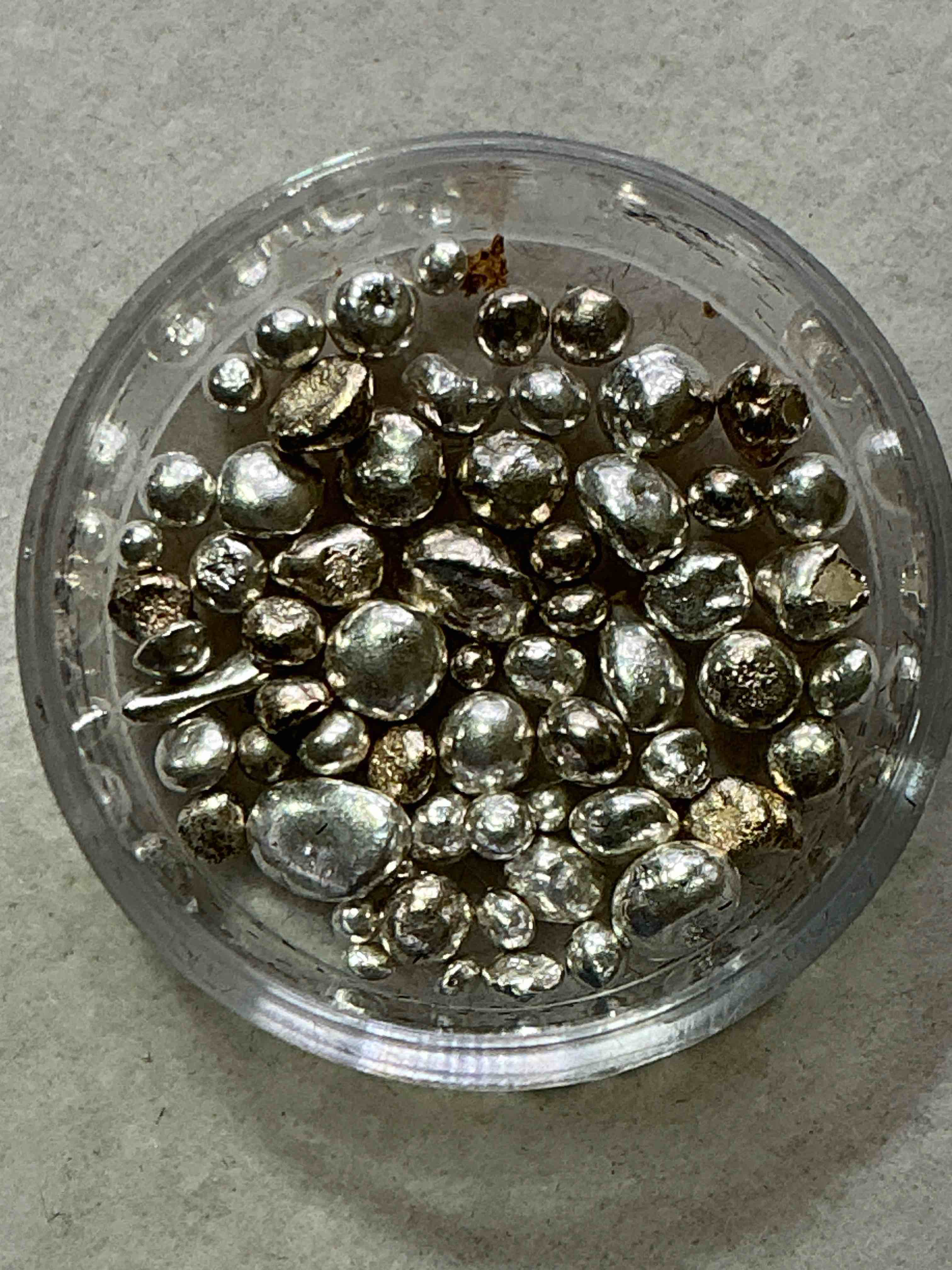 silver nuggets! .999 us fine silver, in small nugget form! total weight of all nuggets in lot approximately 6 grams, bid is per nugget! a cool way to invest in fine us silver! includes collector capsule!