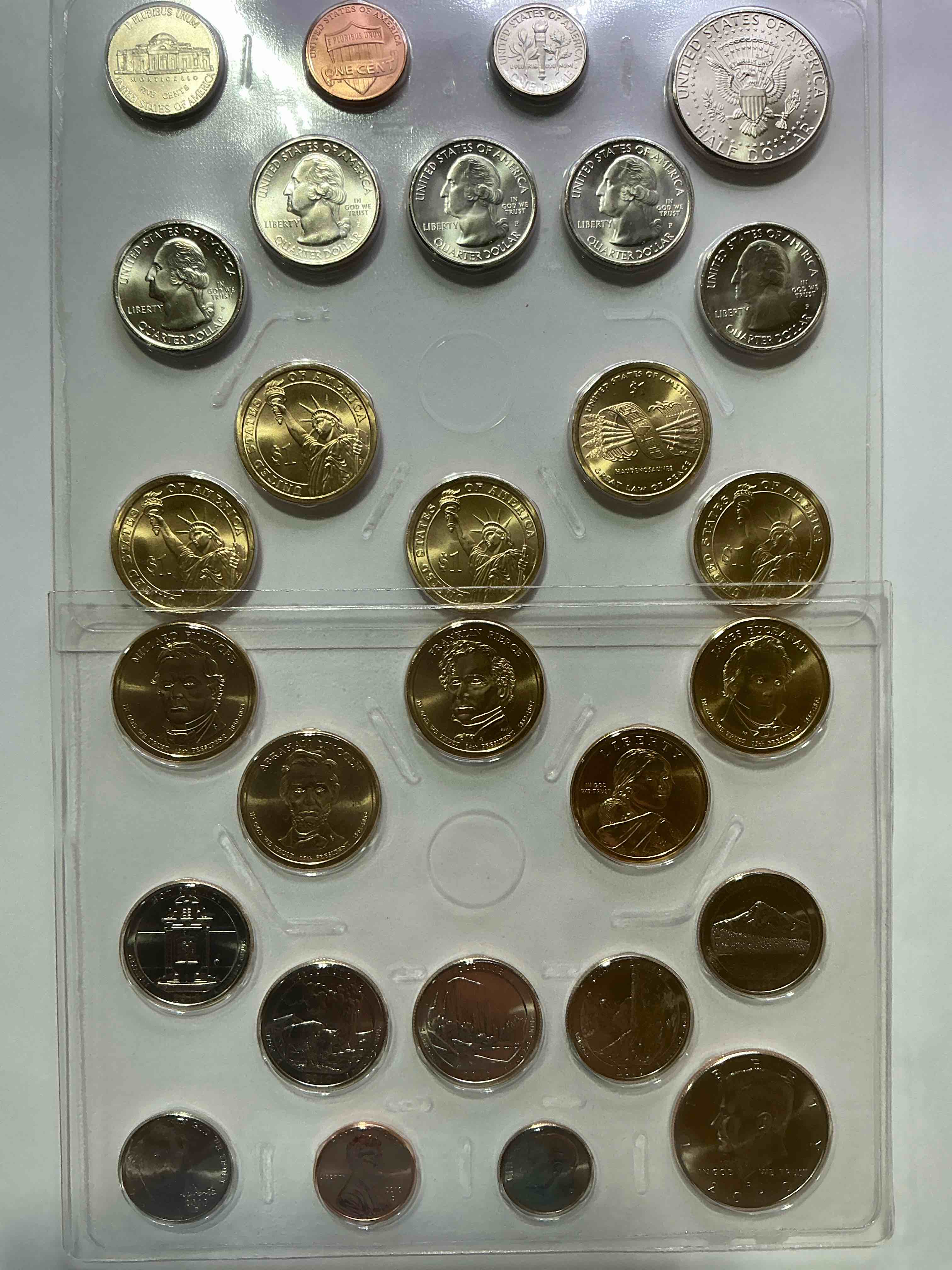 28 coin craziness! denver & philly mints! 2010 uncirculated mint set coins! includes half dollars, president dollar coins, dimes, nickels, pennies & quarters! cool coin collectible! 