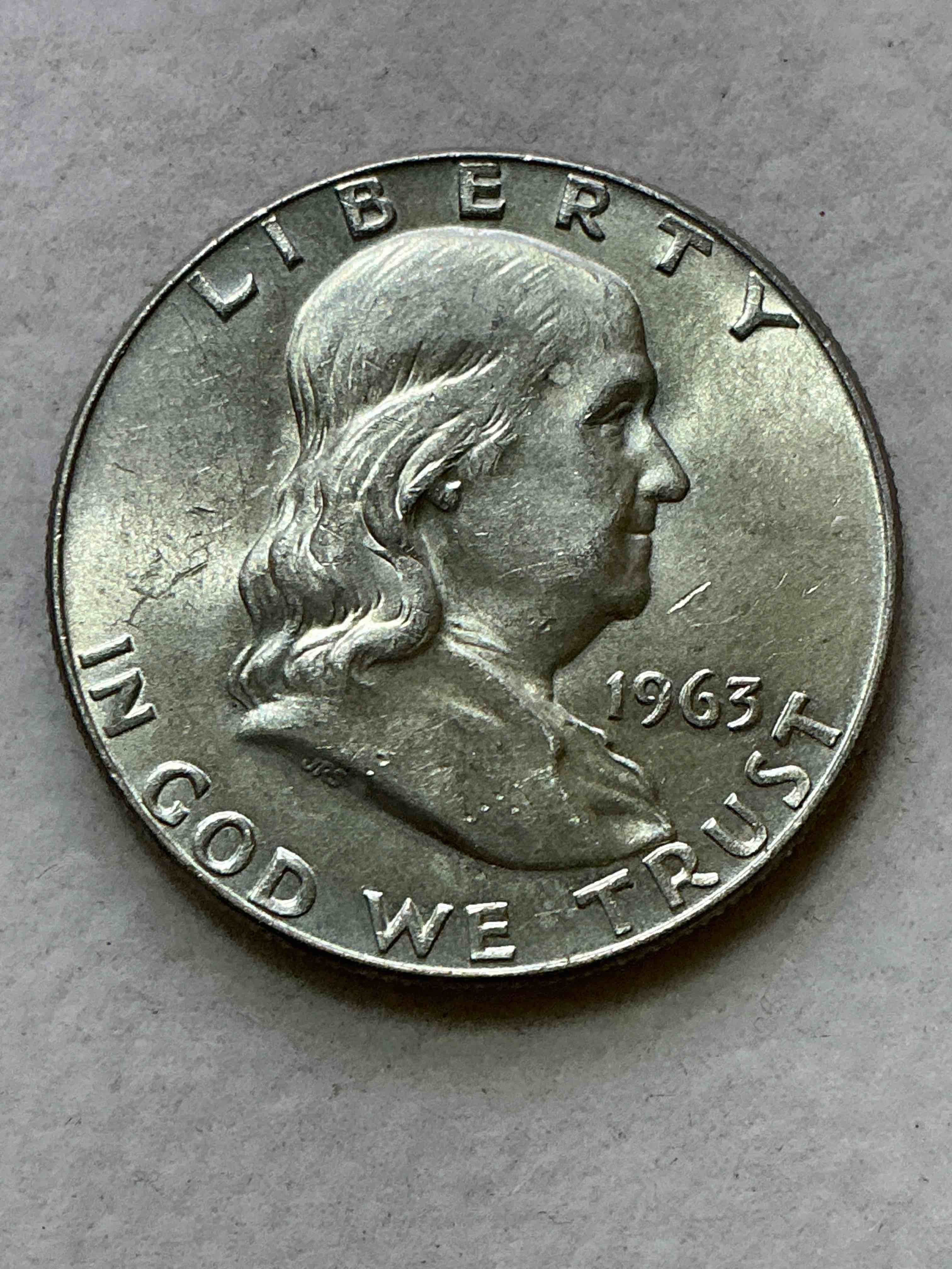 ben franklin silver! pre 1965 silver u.s. half dollar coin! before 1965 american half dollars were actually silver, here is a rare 1963 version in good condition! great for investing in precious metals! these heavy half dollars were minted at 90% silver and 10% copper, giving them a net weight of .36169 ounces of pure silver per coin! very rare in this great condition!