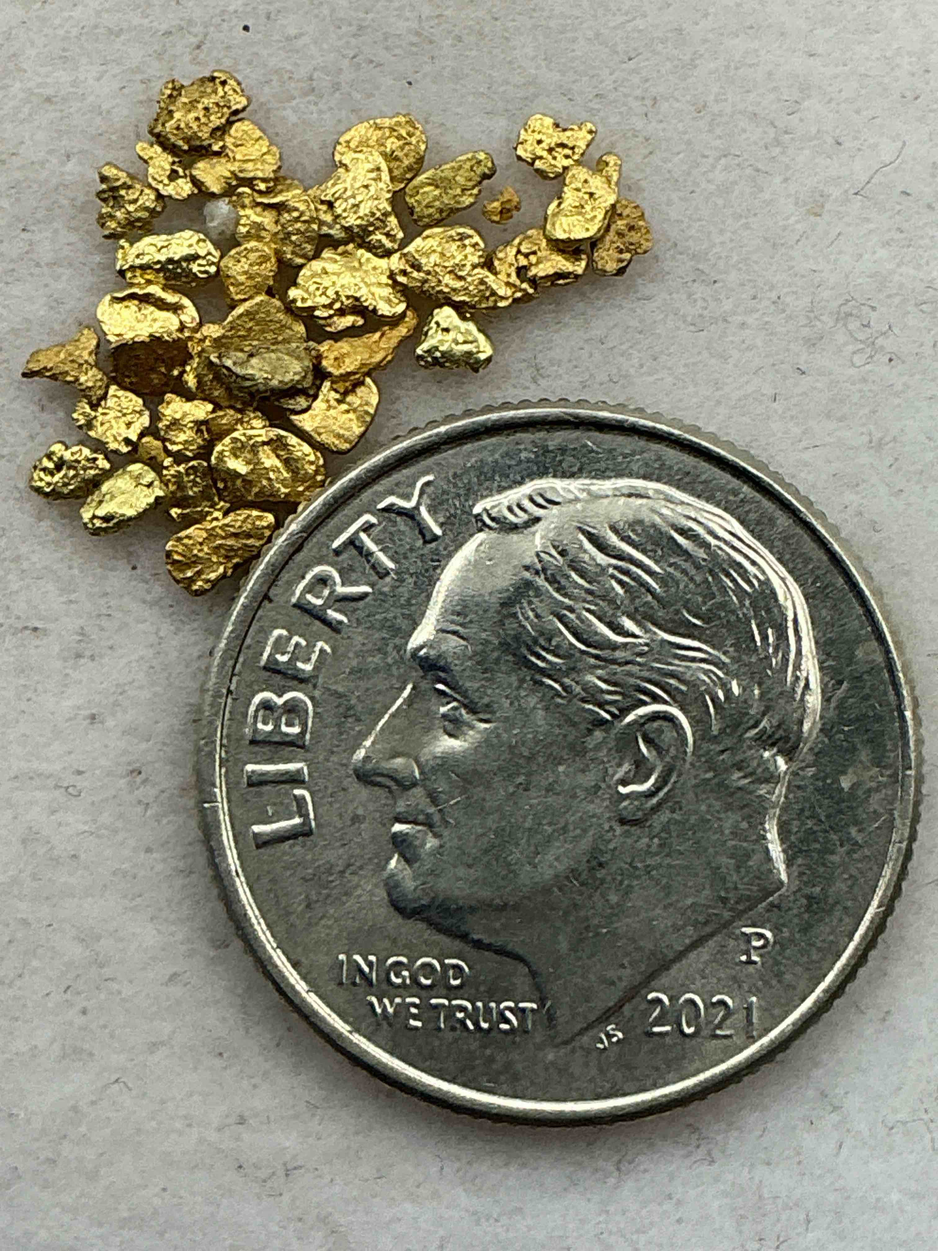 Genuine Gold Nuggets! Gold Nuggets Fresh From Prospecting North Carolina Mountains, Total Weight Of All Nuggets Is Approximately .5 Grams. These Gold Nuggets Typically Test At Between Approx 22-24 Karat. Gold In Raw, Prospected Form Is Extremely Hard To Find & Much Rarer Than Any Refined Form. Get In On The Gold Craze... Gold Has Increased In Value Over 40% Since 2025! U.S. Dime For Size Reference Only (not included). Gold Vile In Image Included. Own Genuine, Gold Nuggets! 