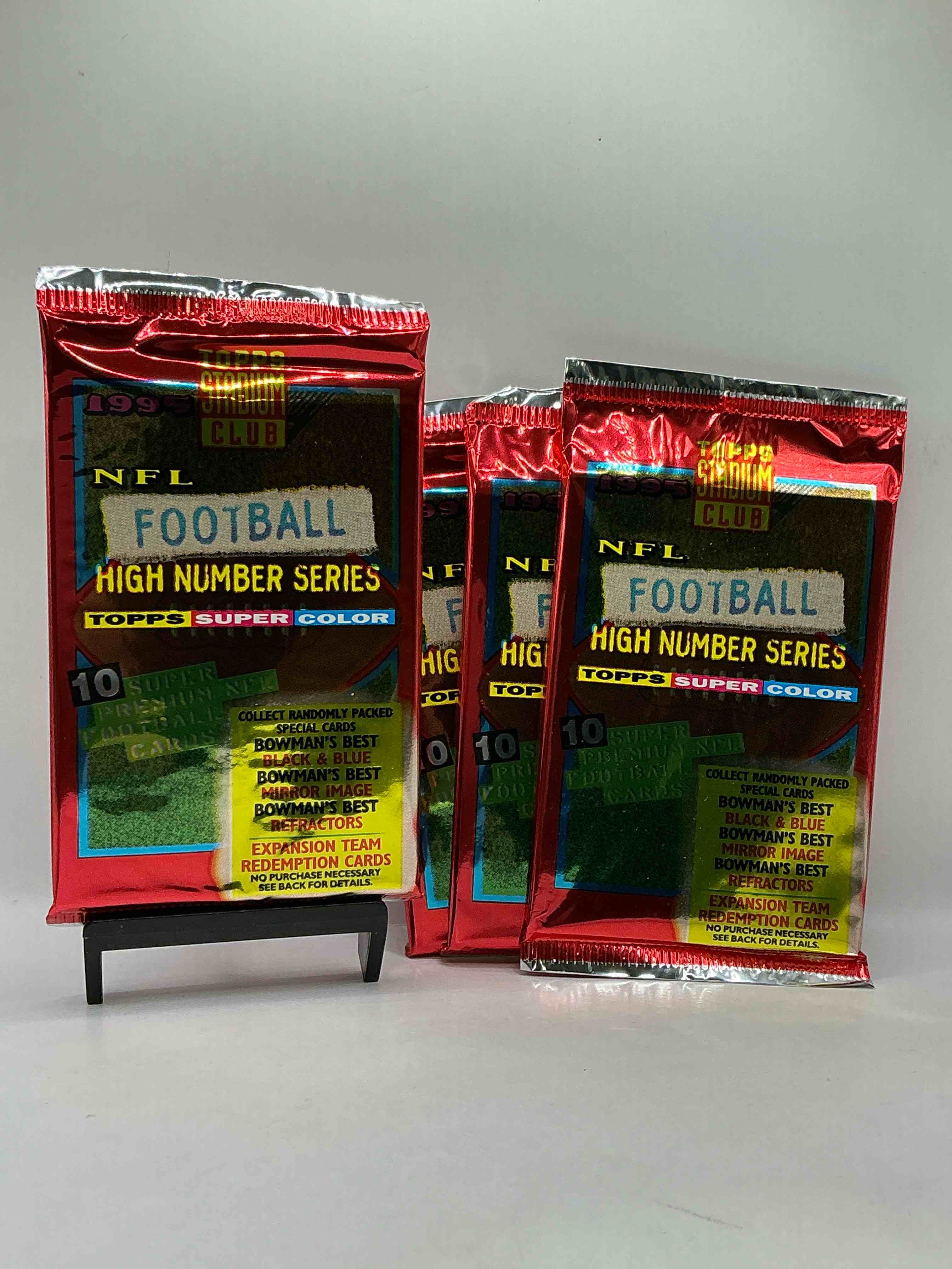 1995 nfl football high number series topps stadium club super color! 10 super premium nfl football cards! collect randomly packed cards, bowman’s best, black & blue, mirror image, refractors & more! rare packs!
