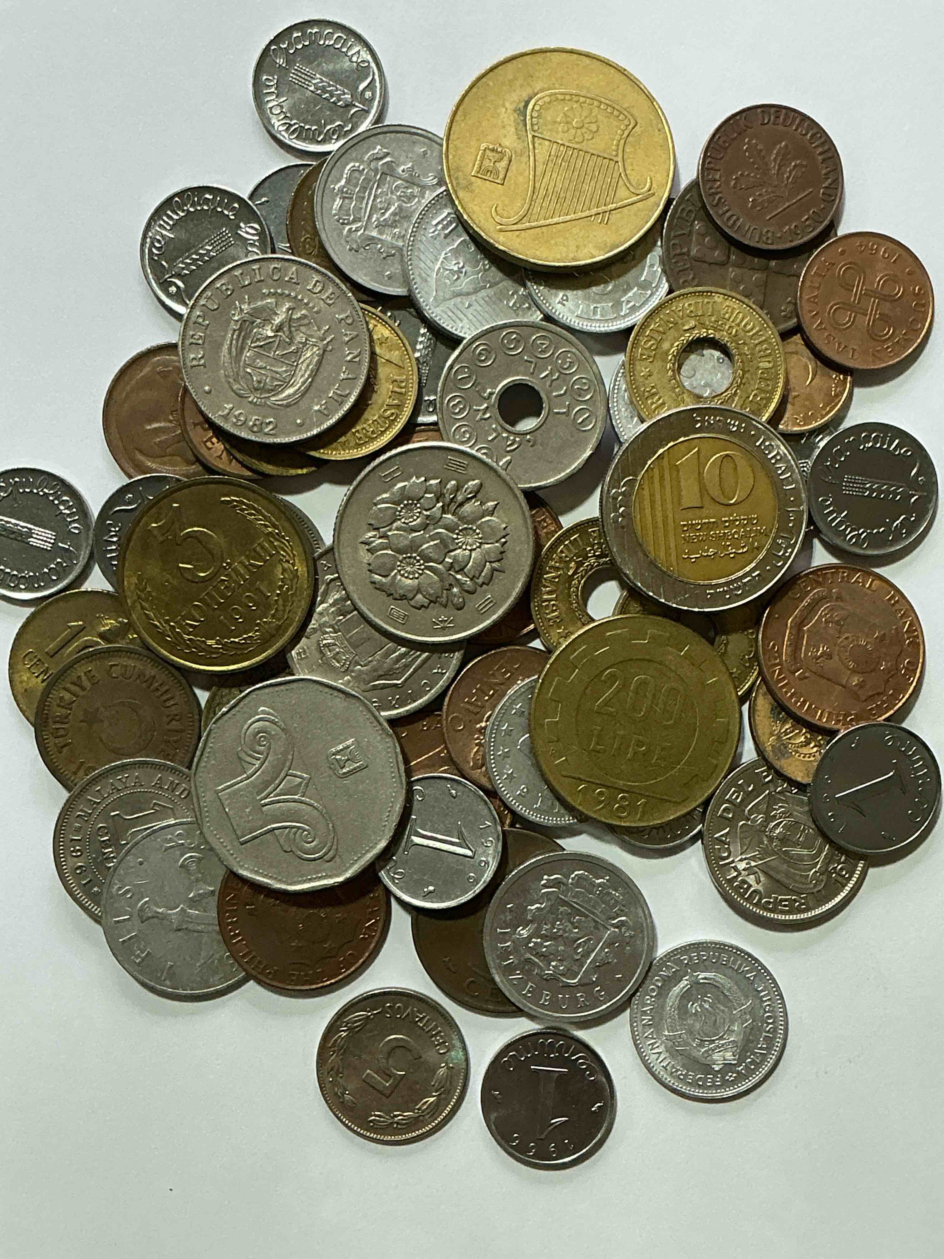 Condition photo showing Good Condition for world coins, antique & vintage! each lot is unique! many different years, countries, sizes & exotic places. this cool collection of antique coins from around the world is loads of fun! have fun identifying each coin & country as a great educational tool! a great investment too!