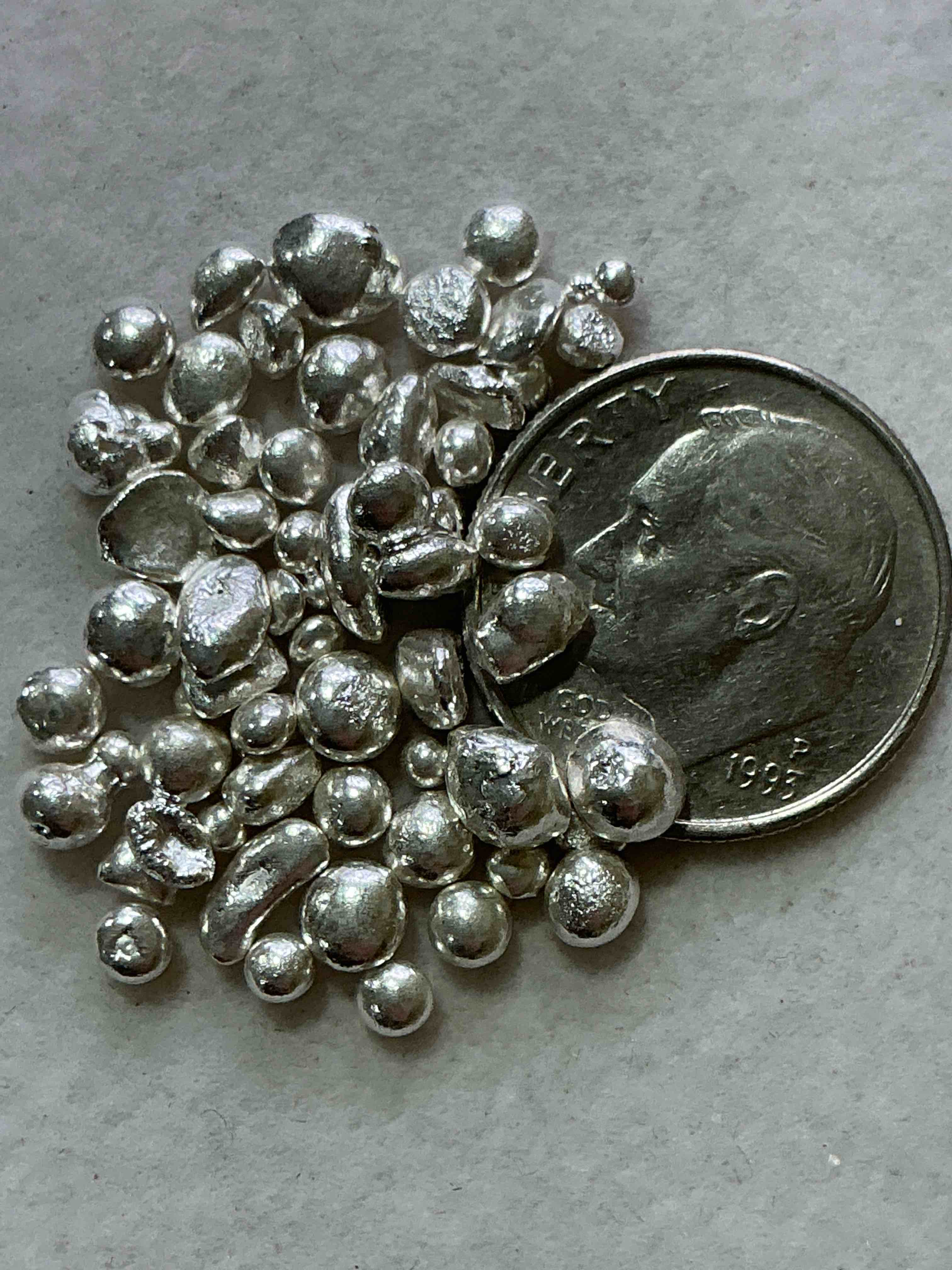 Condition photo showing New/Like New for silver nuggets! .999 us fine silver, in small nugget form! total weight of all nuggets in lot approximately 6 grams, bid is per nugget! a cool way to invest in fine us silver! includes collector capsule!