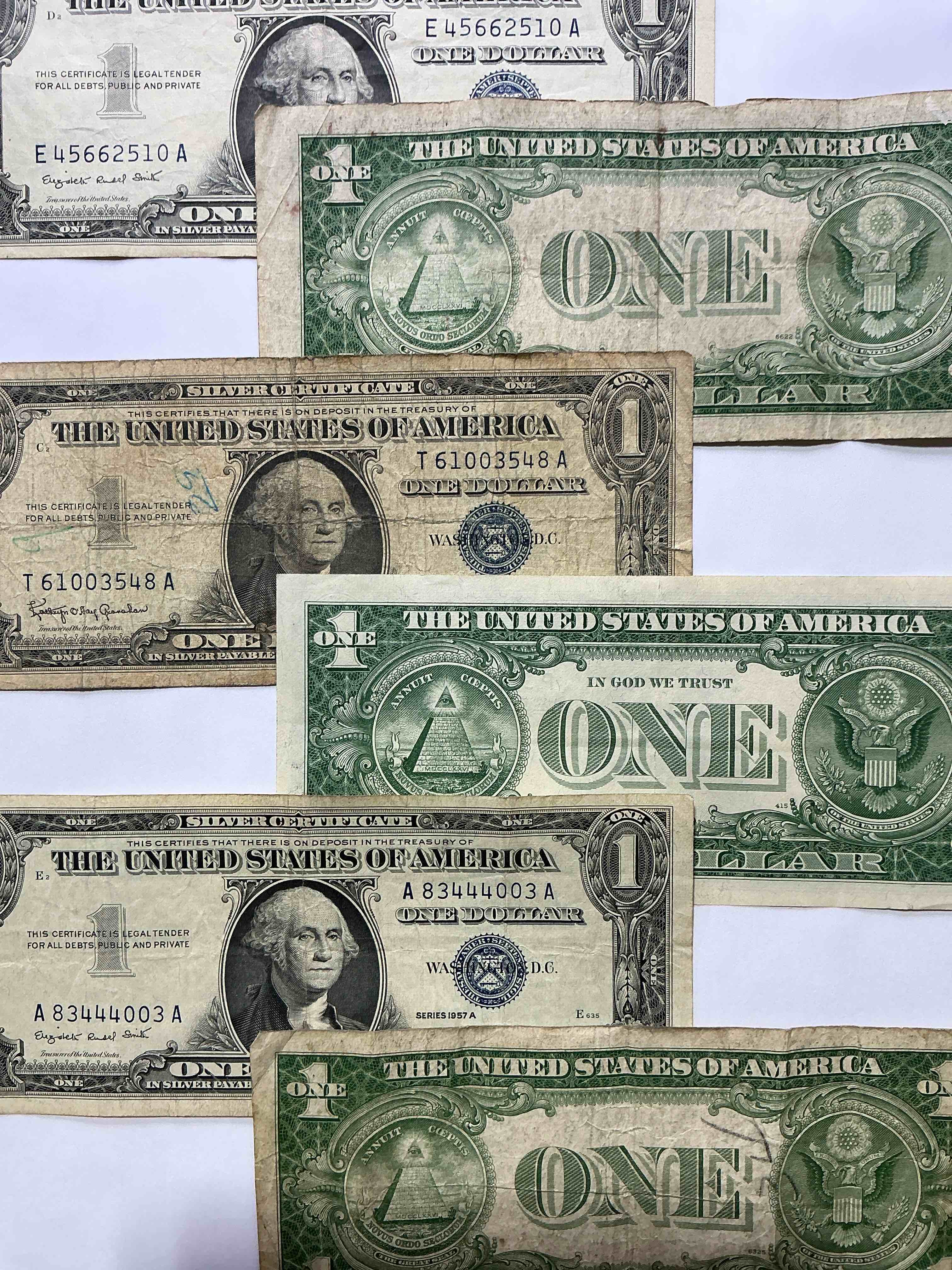 Condition photo showing Good Condition for 1957 silver certificates! did you know that prior to 1964 one dollar u.s. paper money was actually redeemable for silver dollars?! wow how times have changed! silver certificates were produced from 1878 to 1964 & are still considered legal tender at face value. here are gorgeous, circulated 1935 & 1957 u.s. one dollar silver certificate, with highly collectible "blue seal!* own an awesome piece of history!
