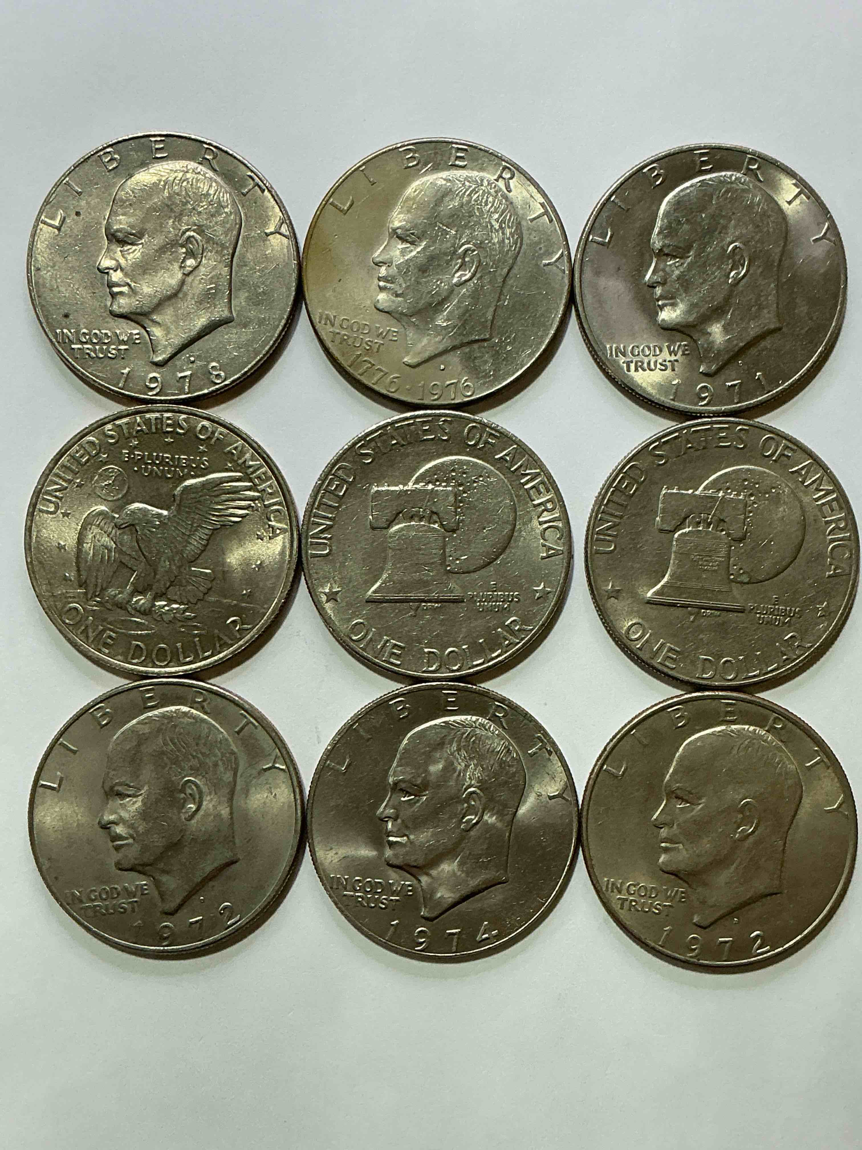 Condition photo showing New/Like New for gorgeous eisenhower dollar coins! these striking, large u.s. coins were minted from 1971-1978. here are gorgeous examples of “ike" dollars from 1976 & other years! these coins have become immensely popular with collectors & some have great toning!