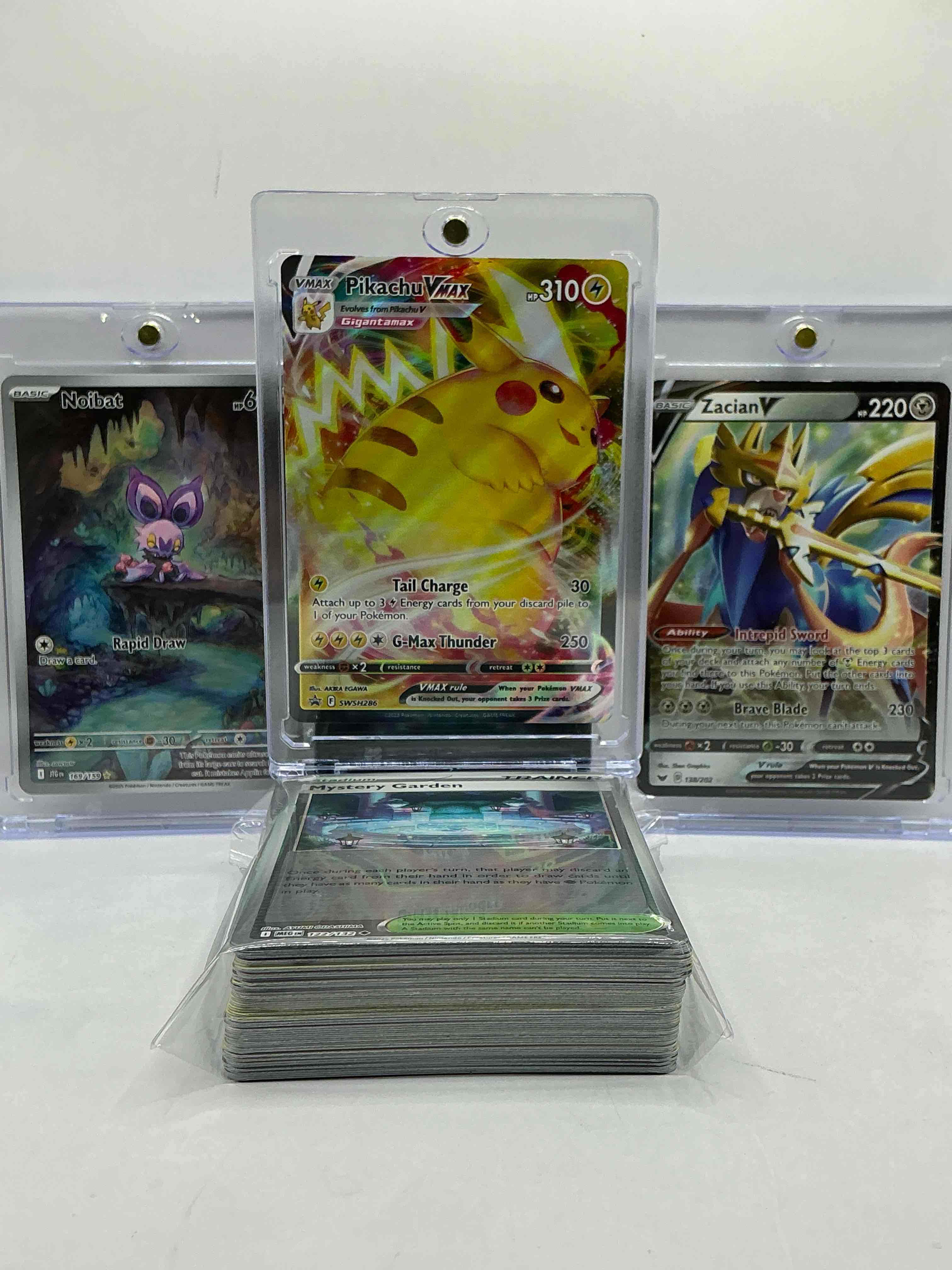 Pikachu VMAX, Noibat Full Art & Zacain V & More! Wow! Along With 50 Other Pokémon Heroes, Holos, Legends & Commons- Including Holographic Cards, Stage 2 Cards, Holos In All Forms & More! Also Includes 36 Non Holo Common/ Uncommon Basic & First Stage Cards Trainers & Energy Too! Perfect Set For Collectors & Enthusiasts!