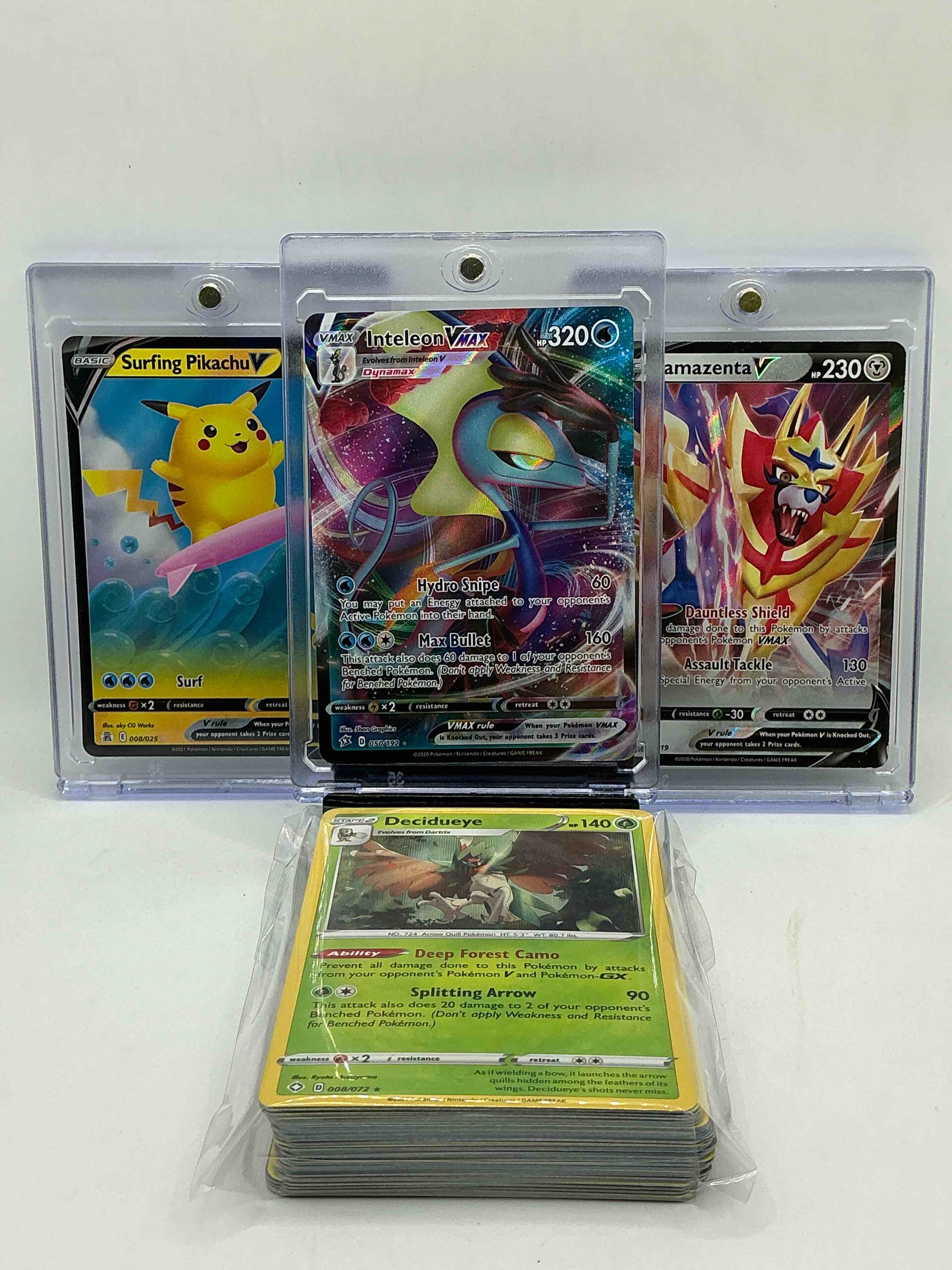 Pokémon Palooza! Inteleon VMax! Surfing Pikachu V! Zamazenta V! Along With 50 Other Pokémon Heroes, Holos, Legends & Commons- Including Holographic Cards, Stage 2 Cards, Holos In All Forms & More! Also Includes 36 Non Holo Common/ Uncommon Basic & First Stage Cards Trainers & Energy Too! Perfect Set For Collectors & Enthusiasts!
