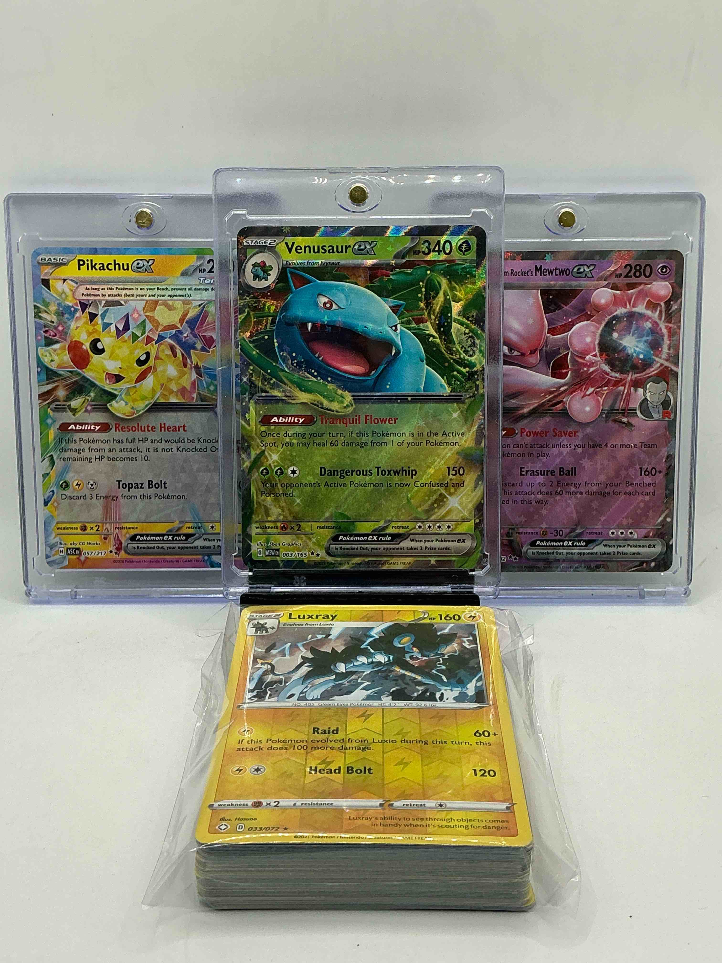 Pokémon Palooza! Venusaur EX! Team Rocket’s Mewtwo EX! Pikachu EX! Along With 50 Other Pokémon Heroes, Holos, Legends & Commons- Including Holographic Cards, Stage 2 Cards, Holos In All Forms & More! Also Includes 36 Non Holo Common/ Uncommon Basic & First Stage Cards Trainers & Energy Too! Perfect Set For Collectors & Enthusiasts!