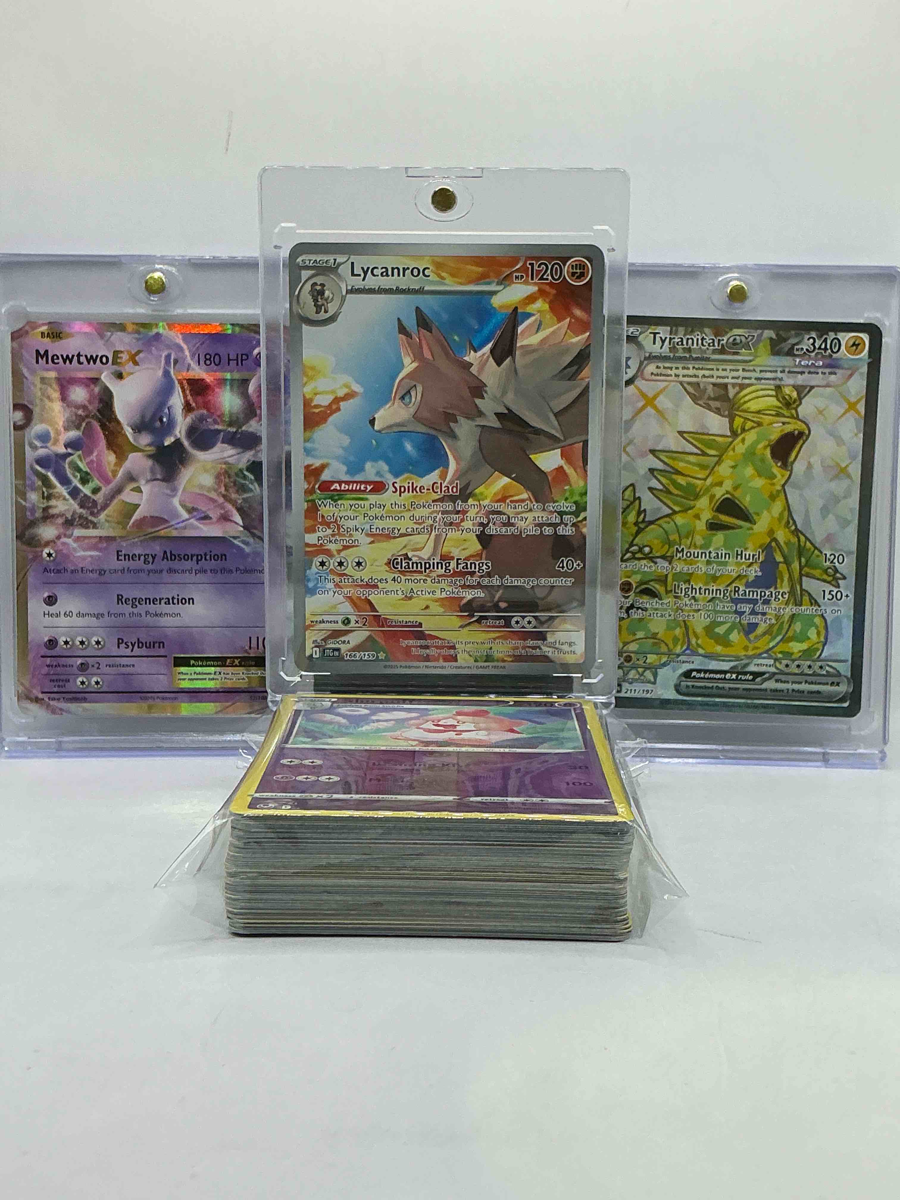 Condition photo showing New/Like New for mewtwo ex, lycanroc full art & tyranitar ex full art! along with 50 other pokémon heroes, holos, legends & commons- including holographic cards, stage 2 cards, holos in all forms & more! also includes 36 non holo common/ uncommon basic & first stage cards trainers & energy too! perfect set for collectors & enthusiasts!