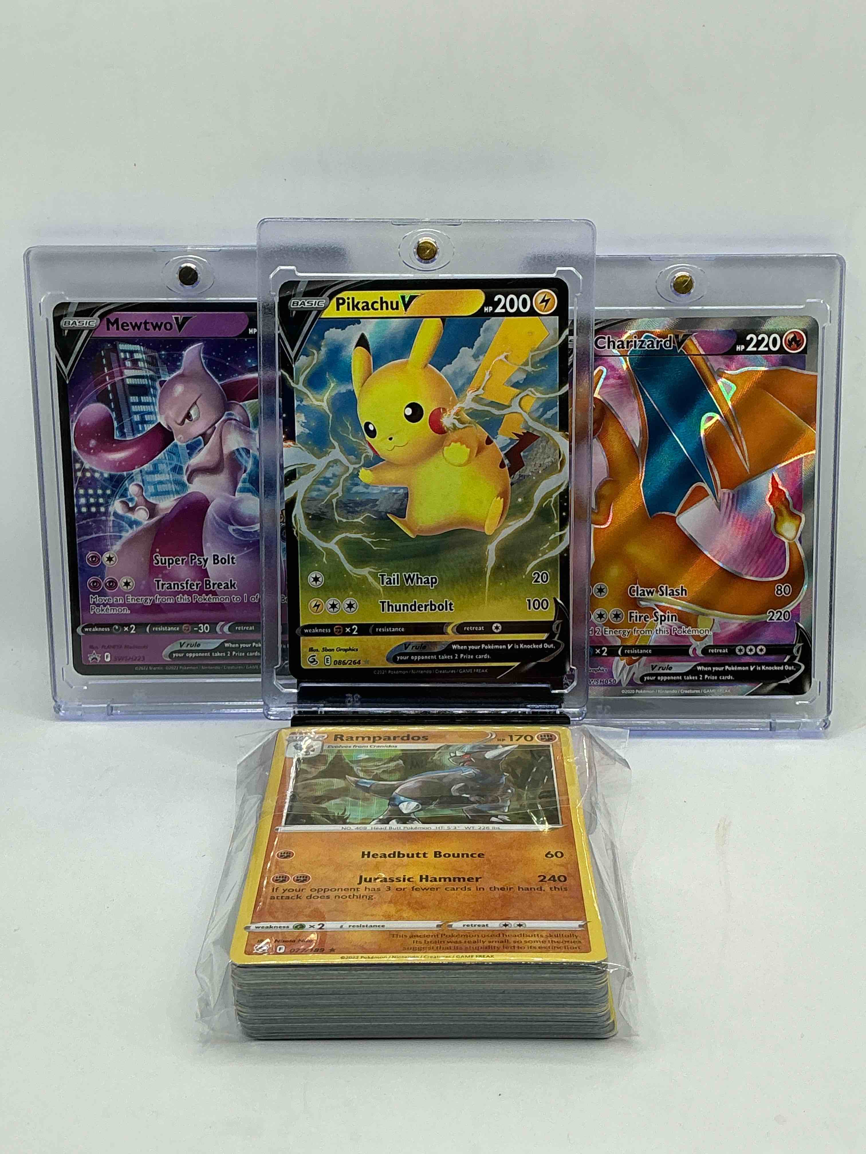 Pokémon Palooza! Charizard V! Mewtwo V! Pikachu V! Along With 50 Other Pokémon Heroes, Holos, Legends & Commons- Including Holographic Cards, Stage 2 Cards, Holos In All Forms & More! Also Includes 36 Non Holo Common/ Uncommon Basic & First Stage Cards Trainers & Energy Too! Perfect Set For Collectors & Enthusiasts!