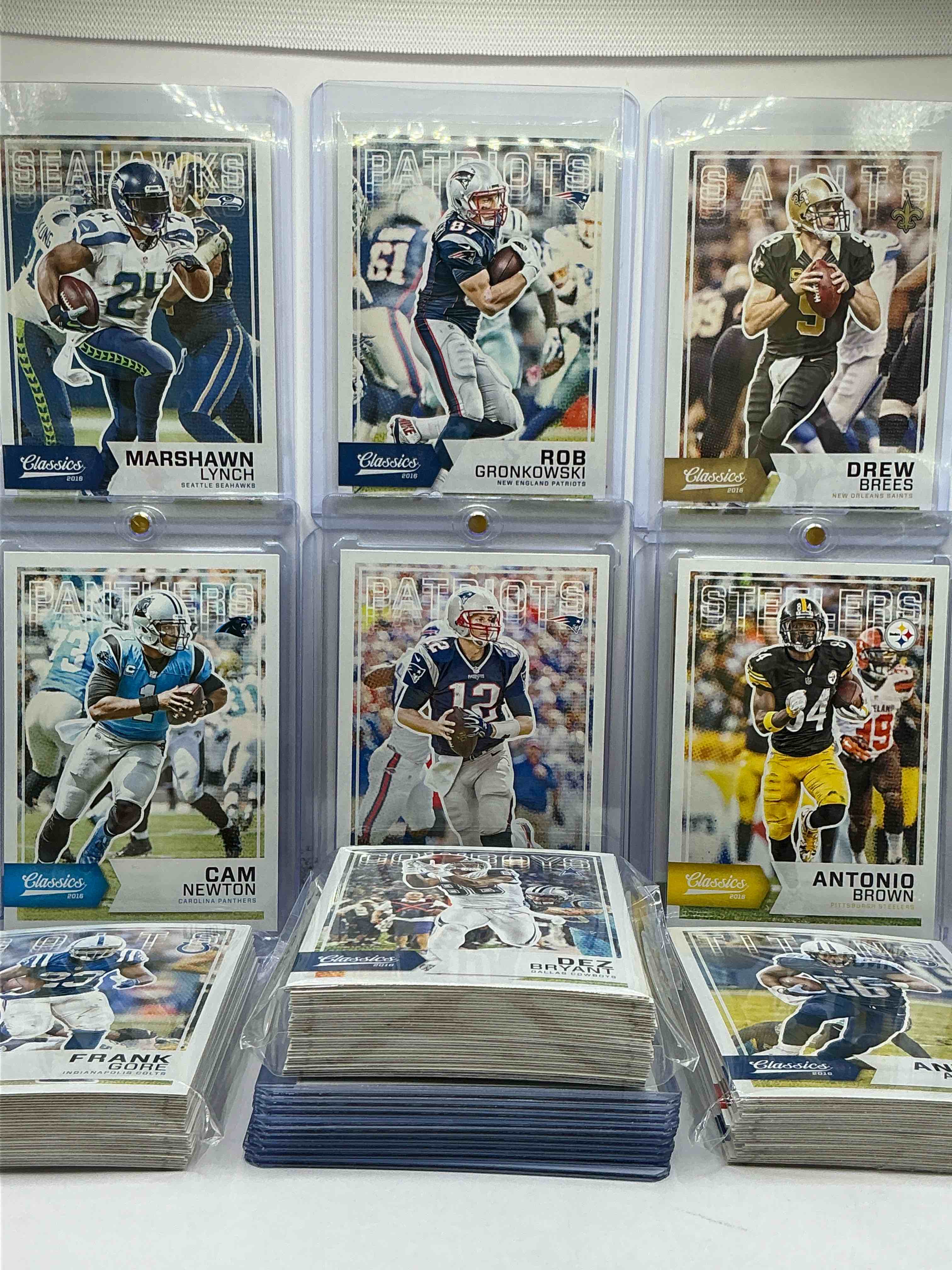 Condition photo showing New/Like New for tom brady, aaron rodgers, antonio brown, cam newton & more! 2016 panini classics 100 card lot! some of the best to ever do it! big ben, brees, gates, gore, dez bryant, stafford, rivers, watt, julio & more! insane trio! 100 card craziness!