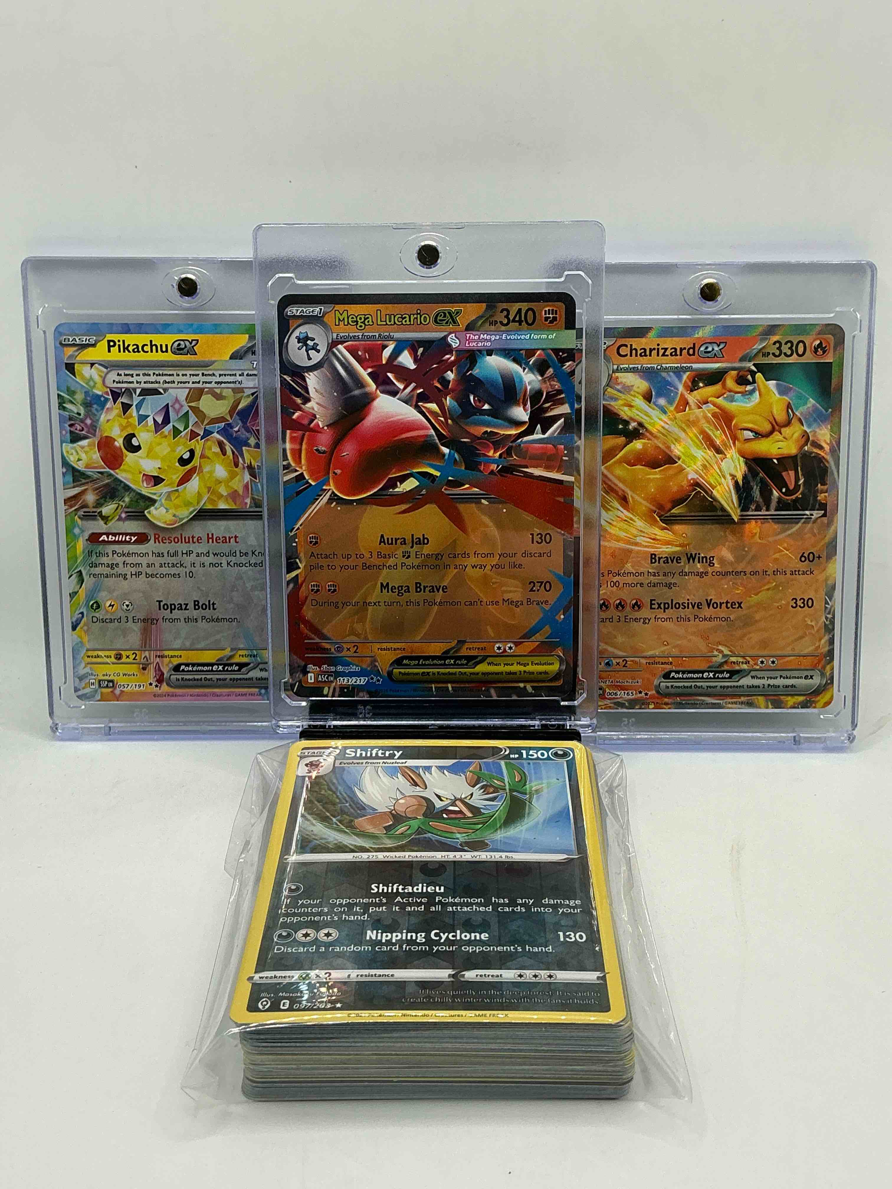 pokémon palooza! mega lucario ex! charizard ezx! pikachu ex! along with 50 other pokémon heroes, holos, legends & commons- including holographic cards, stage 2 cards, holos in all forms & more! also includes 36 non holo common/ uncommon basic & first stage cards trainers & energy too! perfect set for collectors & enthusiasts!
