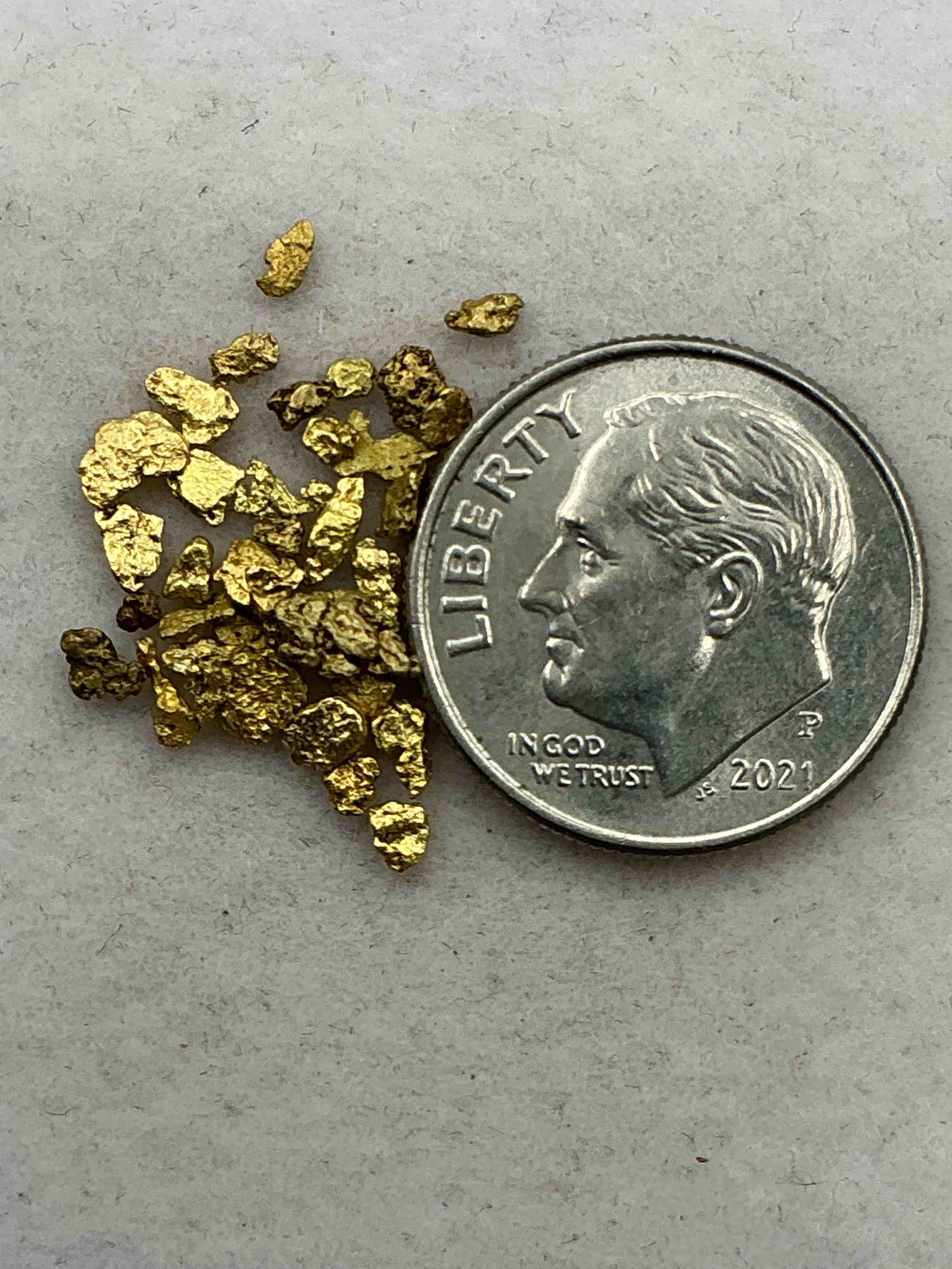 gold nugget, authentic! wow! this is a genuine pure gold nugget prospected from fairplay, colorado. approximately 0.1 gm in size/weight. this type of gold in nugget form that has not been processed is extremely hard to find & is much more rare than processed gold in any form. u.s. dime shown in image is for visual size reference only (not included). own an incredibly cool piece of gold & an awesome investment in fine u.s. gold precious metal! every gold nugget is "one of a kind!"