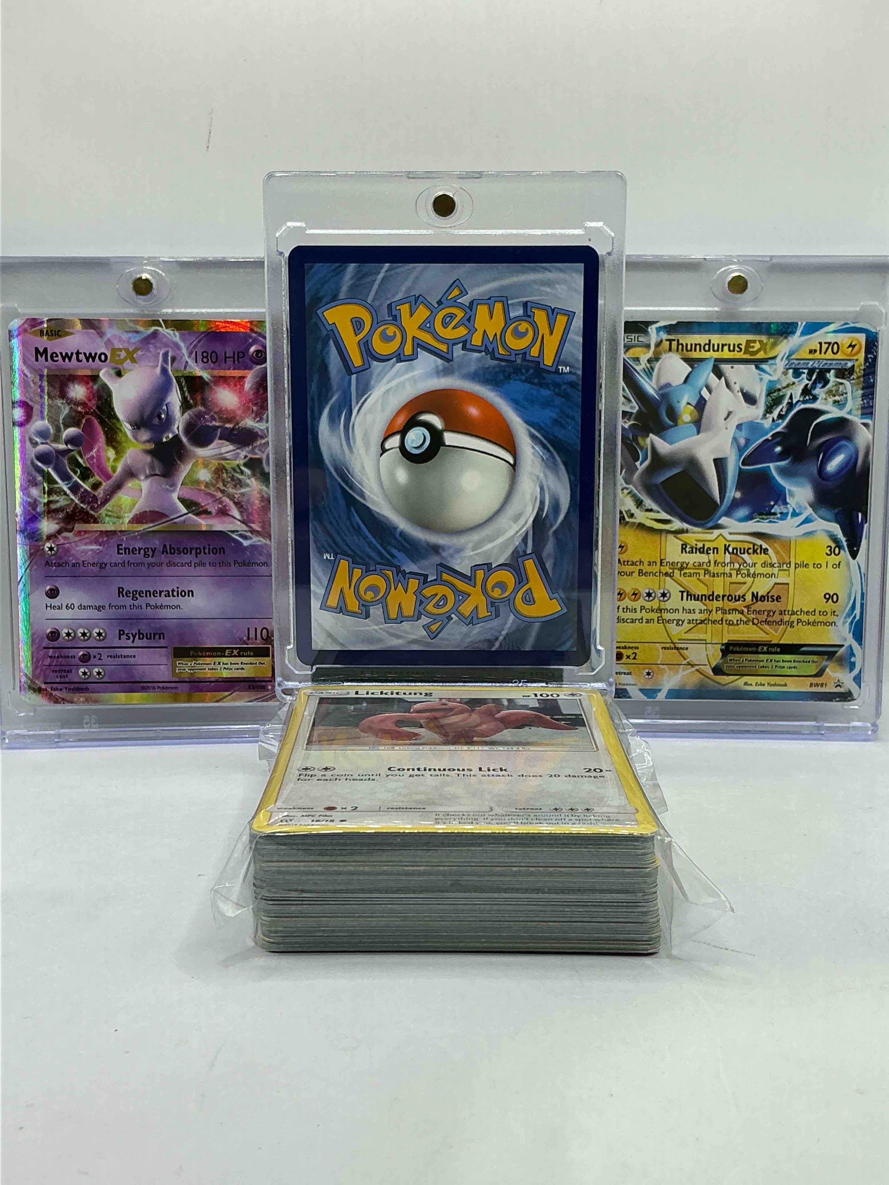 Condition photo showing New/Like New for charizard ex, mewtwo ex, thundrus ex & more! pokémon palooza! along with 50 other pokémon heroes, holos, legends & commons- including holographic cards, stage 2 cards, holos in all forms & more! also includes 36 non holo common/ uncommon basic & first stage cards trainers & energy too! perfect set for collectors & enthusiasts!