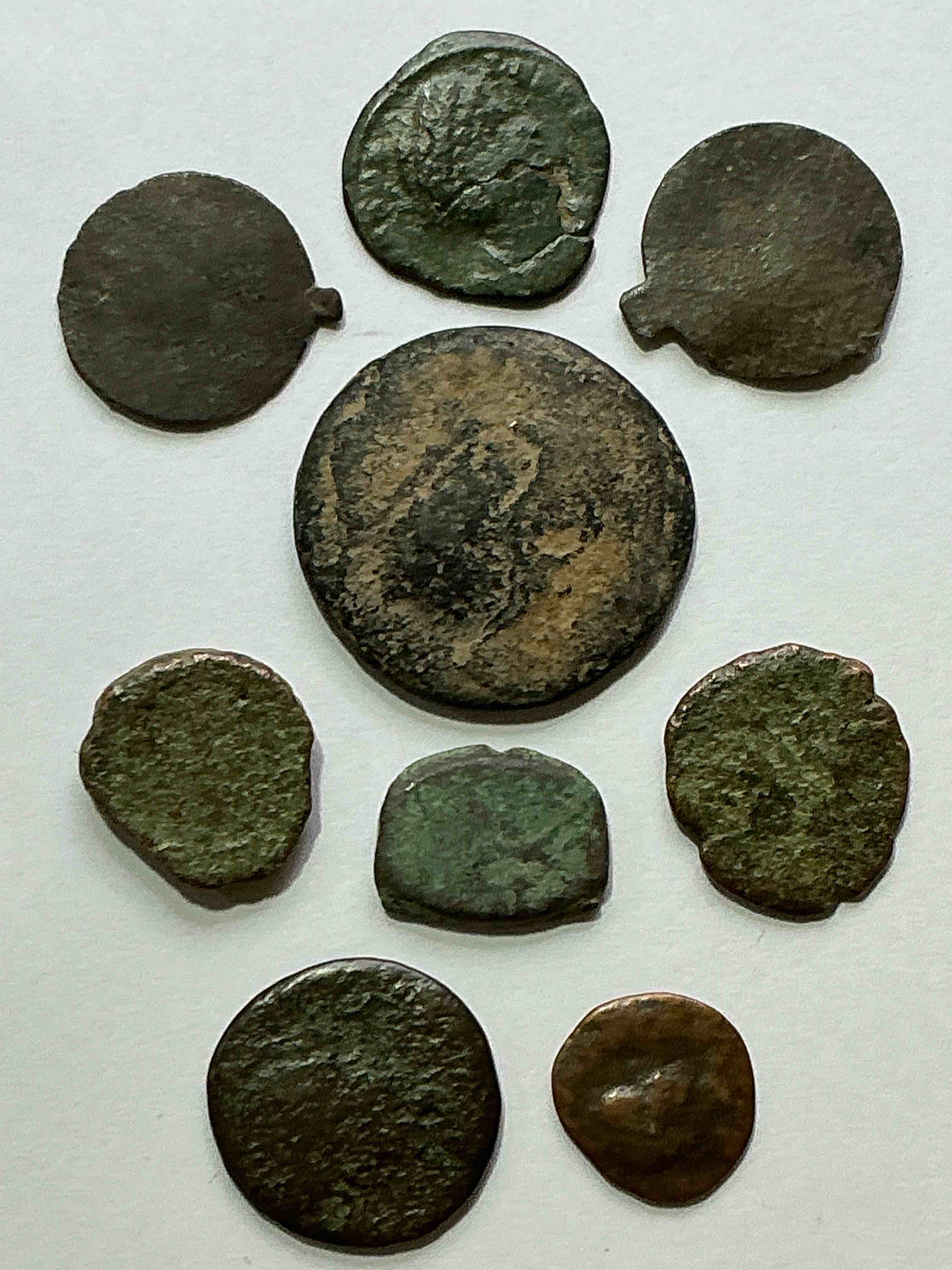 ancient roman coins! 1,600-1700 years old approximately! check out these amazing authentic pieces of history, ancient roman bronze coins from the approx 300 to 400 a.d era... serious pieces of history & serious colléctor items! own authentic pieces of ancient history!