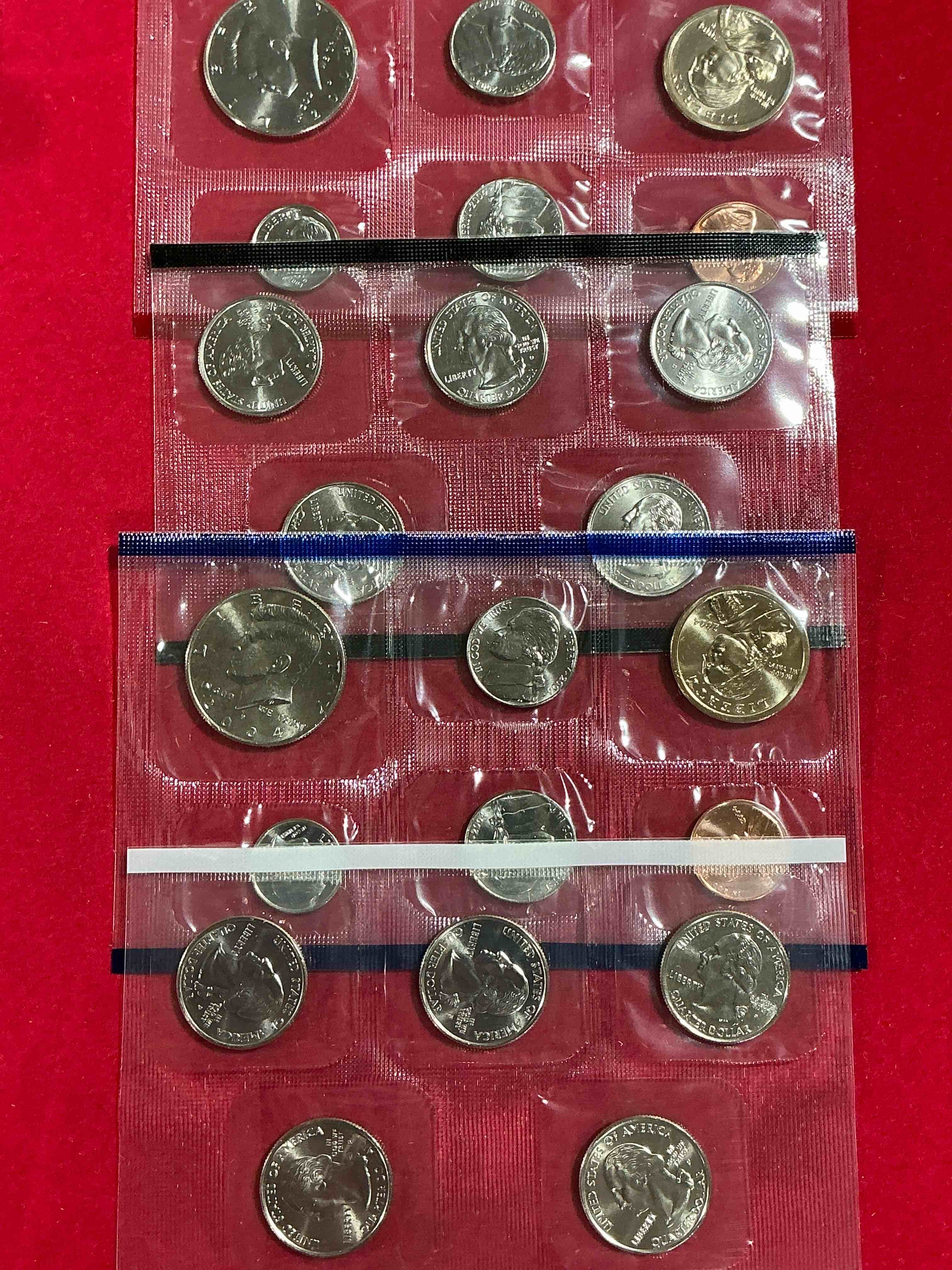 no way! full denver & philadelphia 2004 mint sets, 22 total coins! these mint sets are highly coveted for their coins inside… 22 coins, two sacagawea dollars, two half dollars, quarters, nickels, dimes & pennies! wow