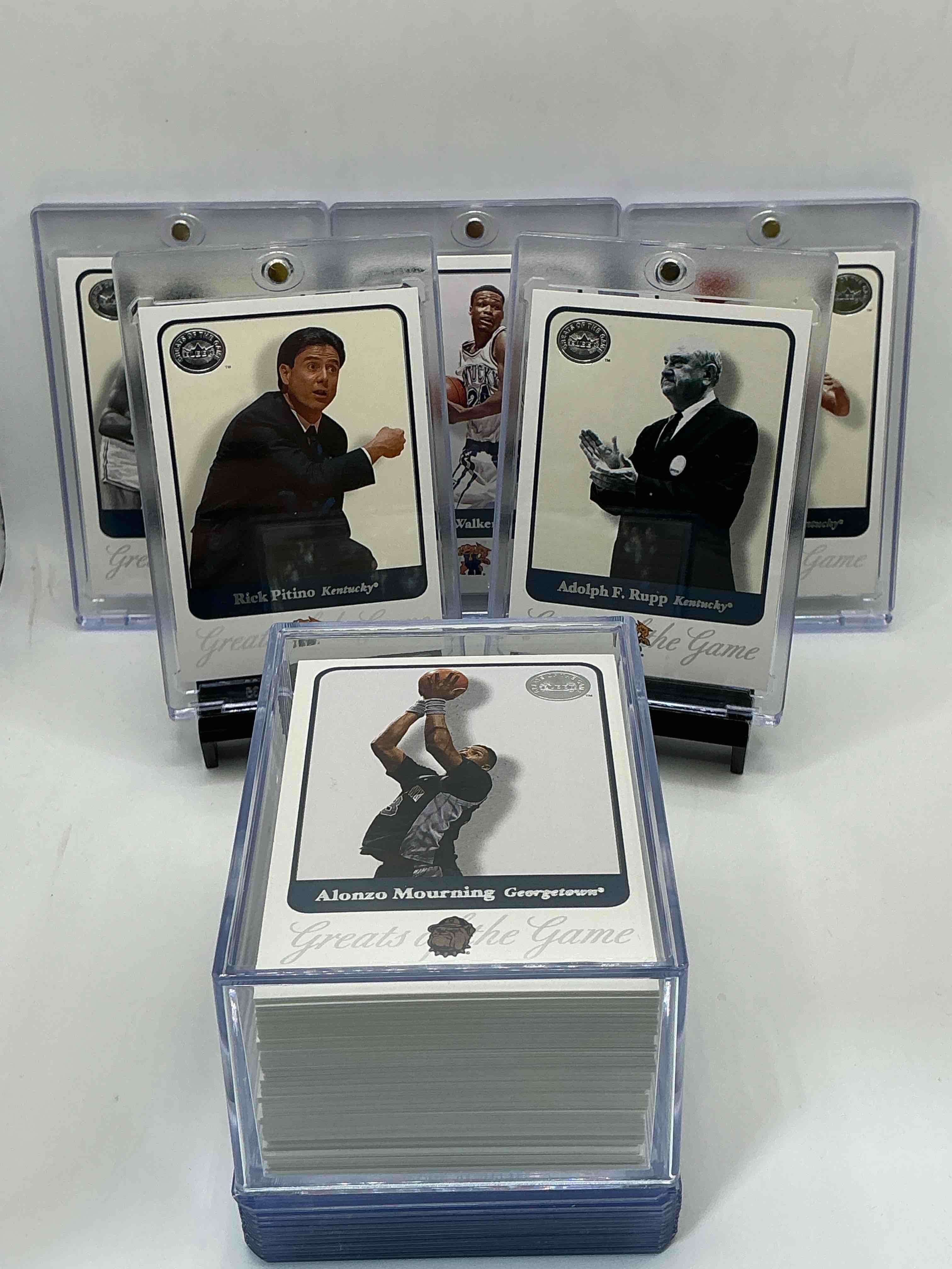 ultra rare basketball! 2001 fleer/skybox “greats of the game” complete 84 card set, excellent condition! all cards sleeved in protective cases! this rare set includes the greatest college players of all time, men & women! a serious collectors item almost impossible to find complete & in this great condition!