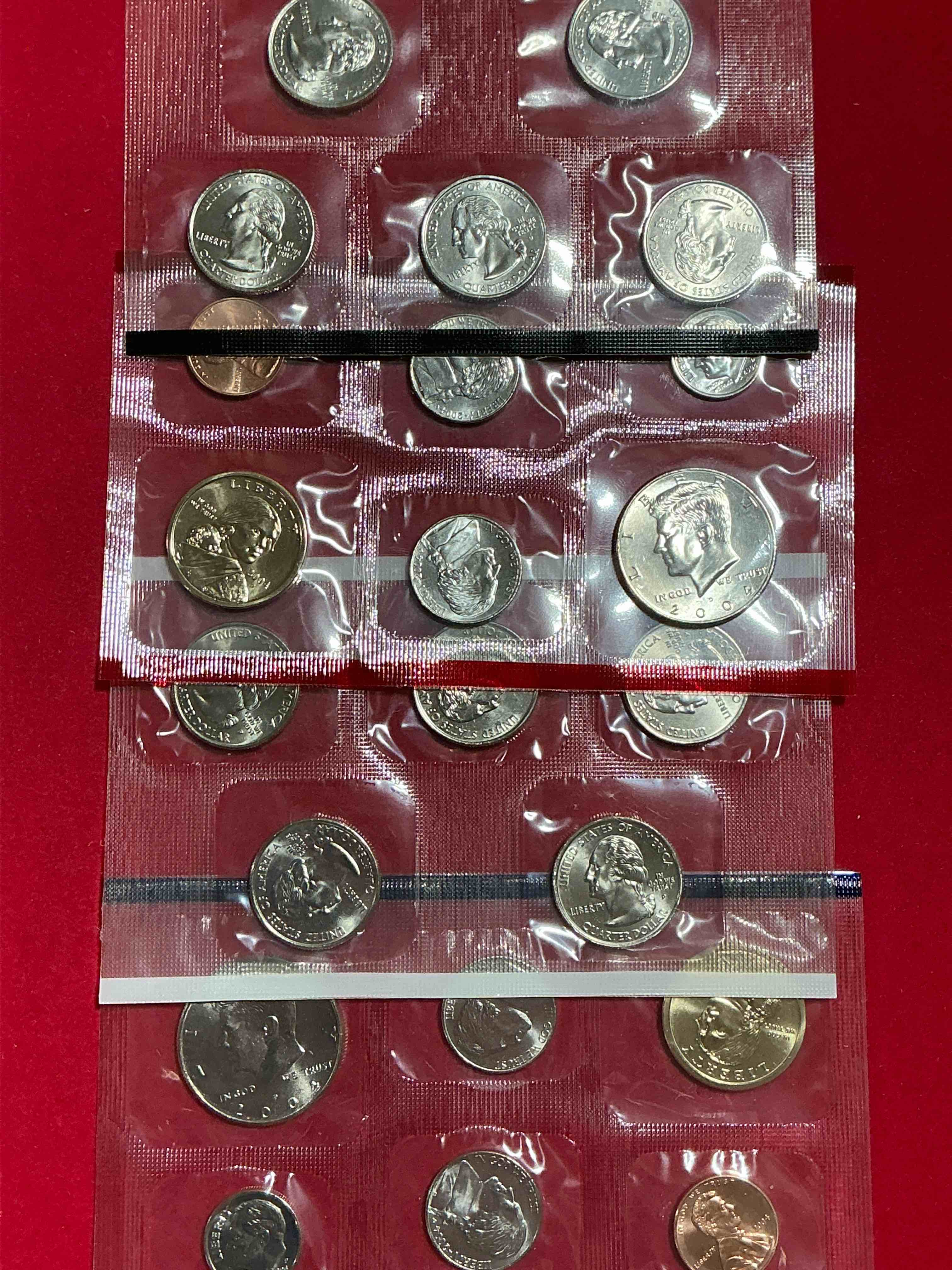 no way! full denver & philadelphia 2004 mint sets, 22 total coins! these mint sets are highly coveted for their coins inside… 22 coins, two sacagawea dollars, two half dollars, quarters, nickels, dimes & pennies! wow!