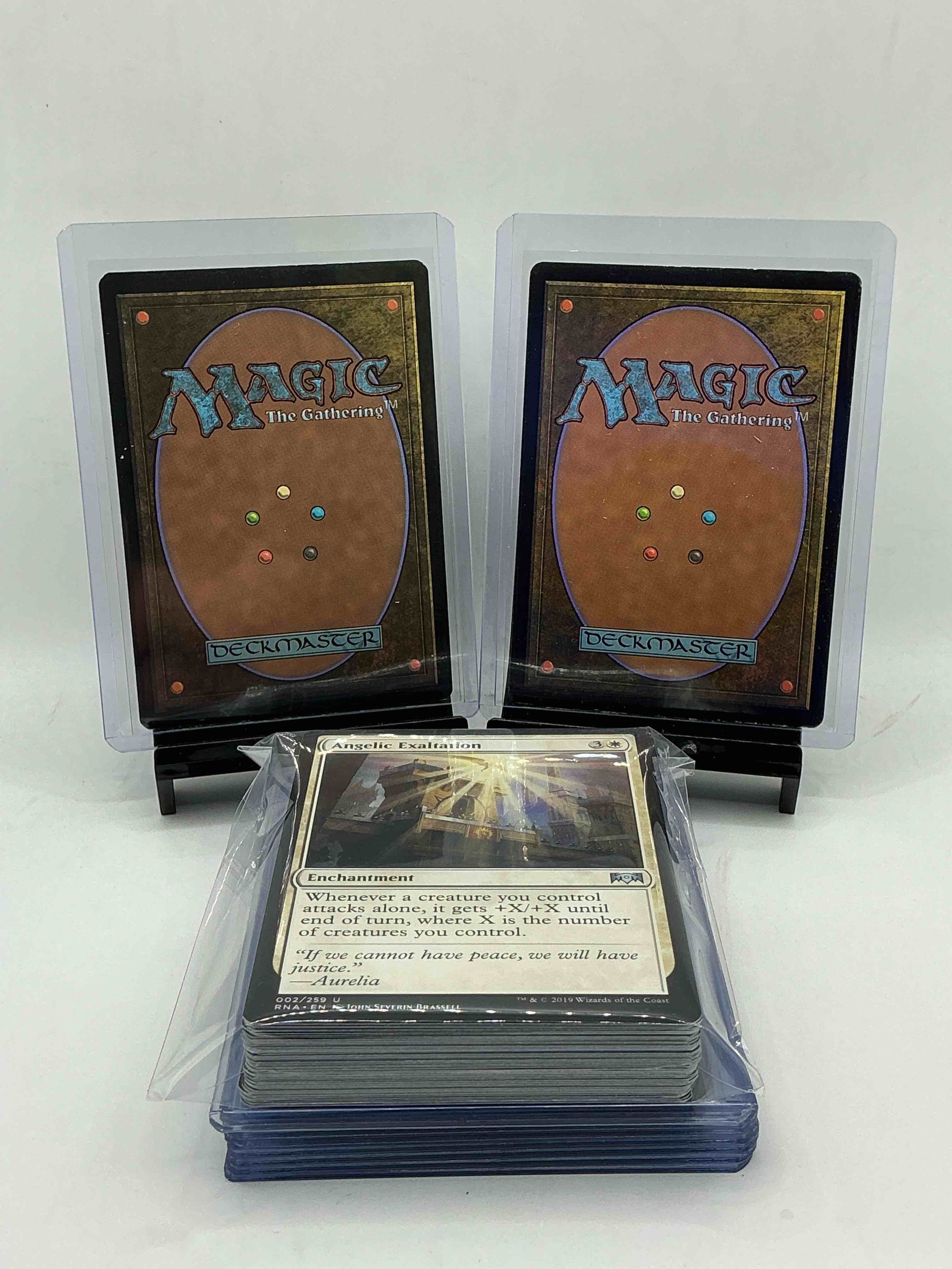 Condition photo showing New/Like New for magic the gathering 50 card lot! lot includes 10 rare or holo foil cards! all cards in excellent shape condition! a great way to join the mtg craze!