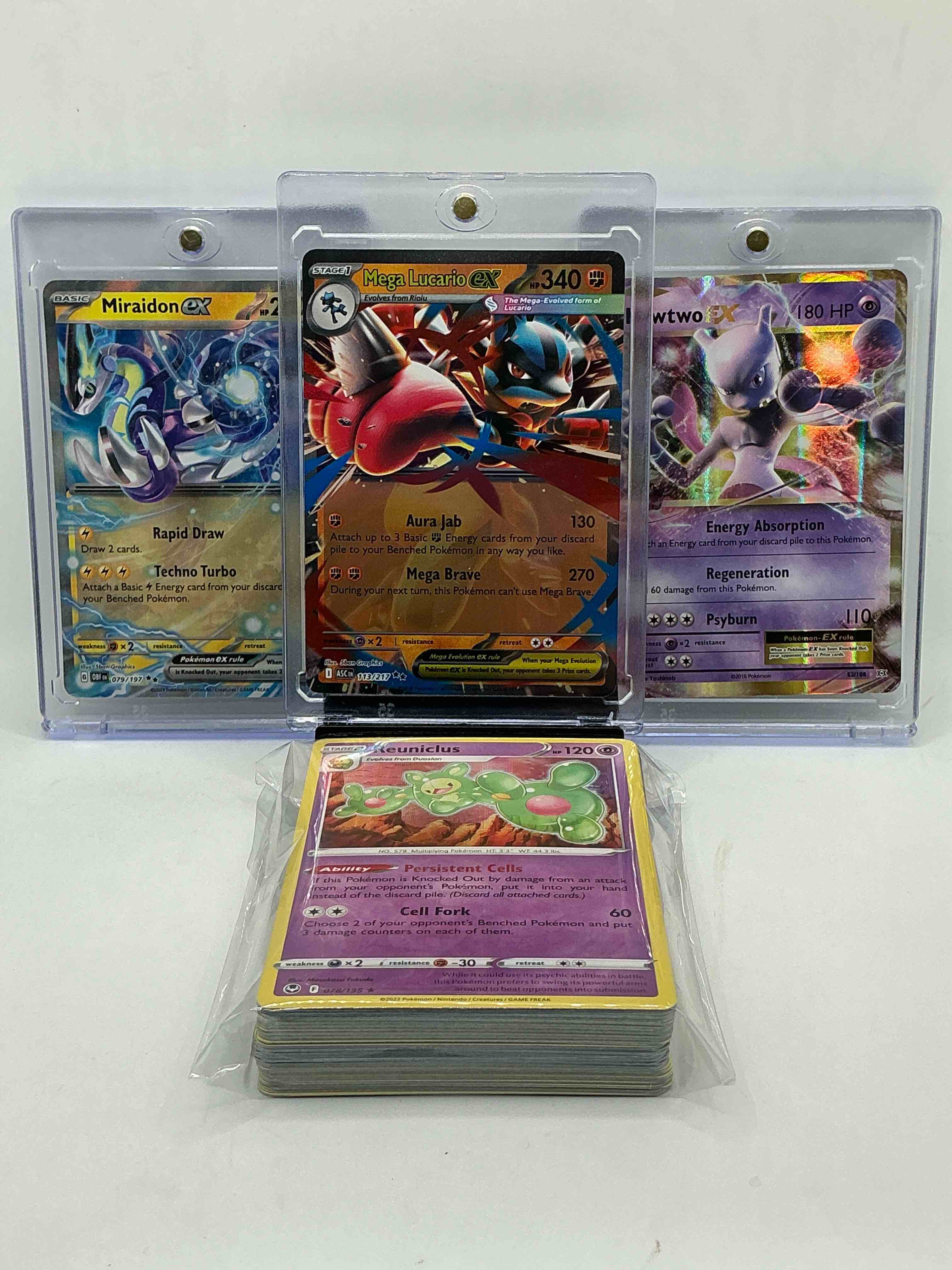 Pokémon Palooza! Mega Lucario EX! Miraidon EX! Mewtwo EX! Along With 50 Other Pokémon Heroes, Holos, Legends & Commons- Including Holographic Cards, Stage 2 Cards, Holos In All Forms & More! Also Includes 36 Non Holo Common/ Uncommon Basic & First Stage Cards Trainers & Energy Too! Perfect Set For Collectors & Enthusiasts!