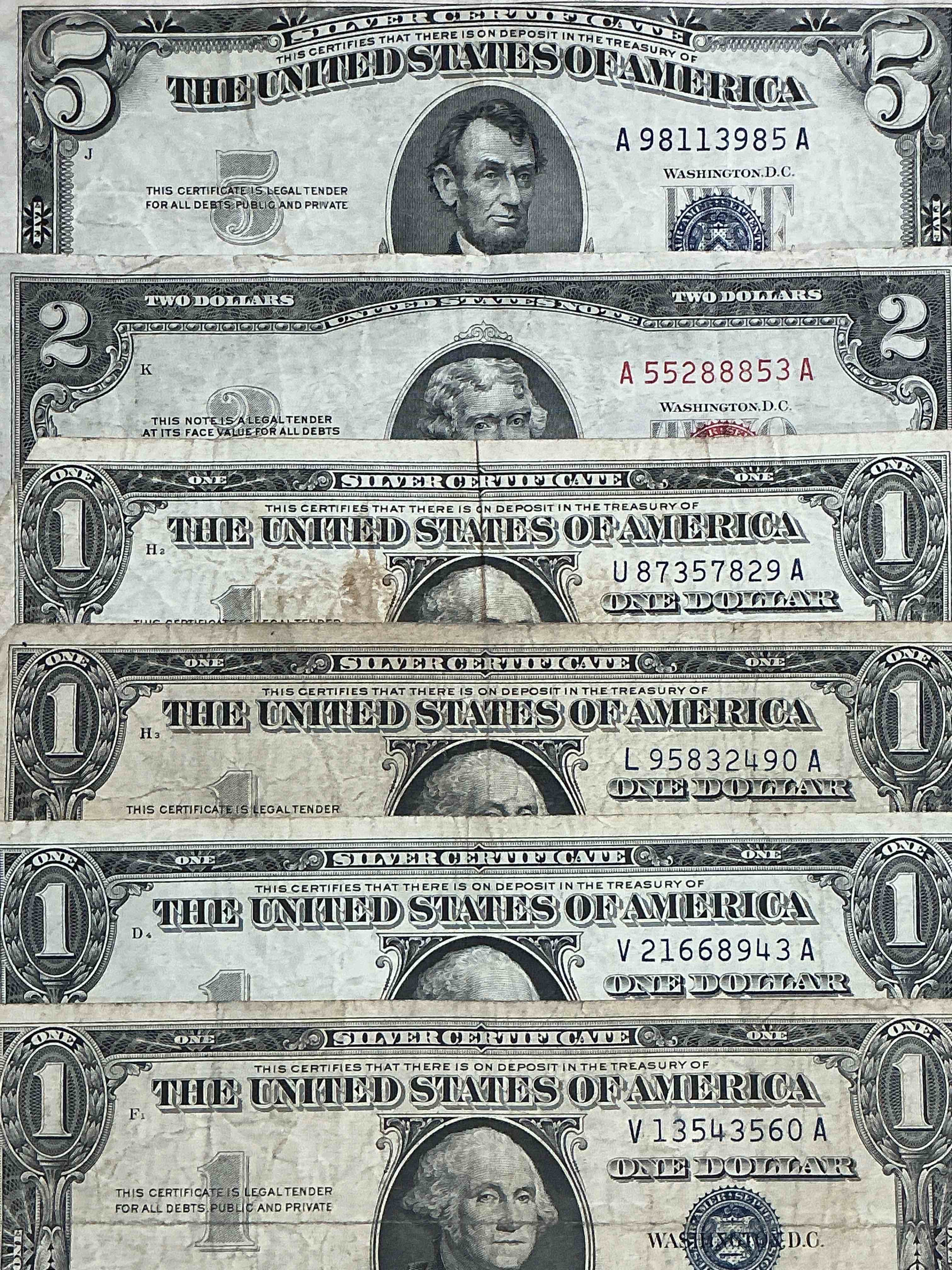 Rare American Dollar Bills! Red Seal Five Dollar Bill & Red Seal Two Dollar Bill, Along With Silver Certificates! Five Dollar Bill Ultra Rare & In Good Condition, Red Seal Two Dollar Bill In Good Condition & Silver Certificates Produced From 1878 To 1964 & Are Still Considered Legal Tender At Face Value. Here Are Gorgeous, Circulated 1935 & 1957 U.S. One Dollar Silver Certificate, With Highly Collectible "Blue Seal!* Own An Awesome Piece Of History! American Dollar Lot! 