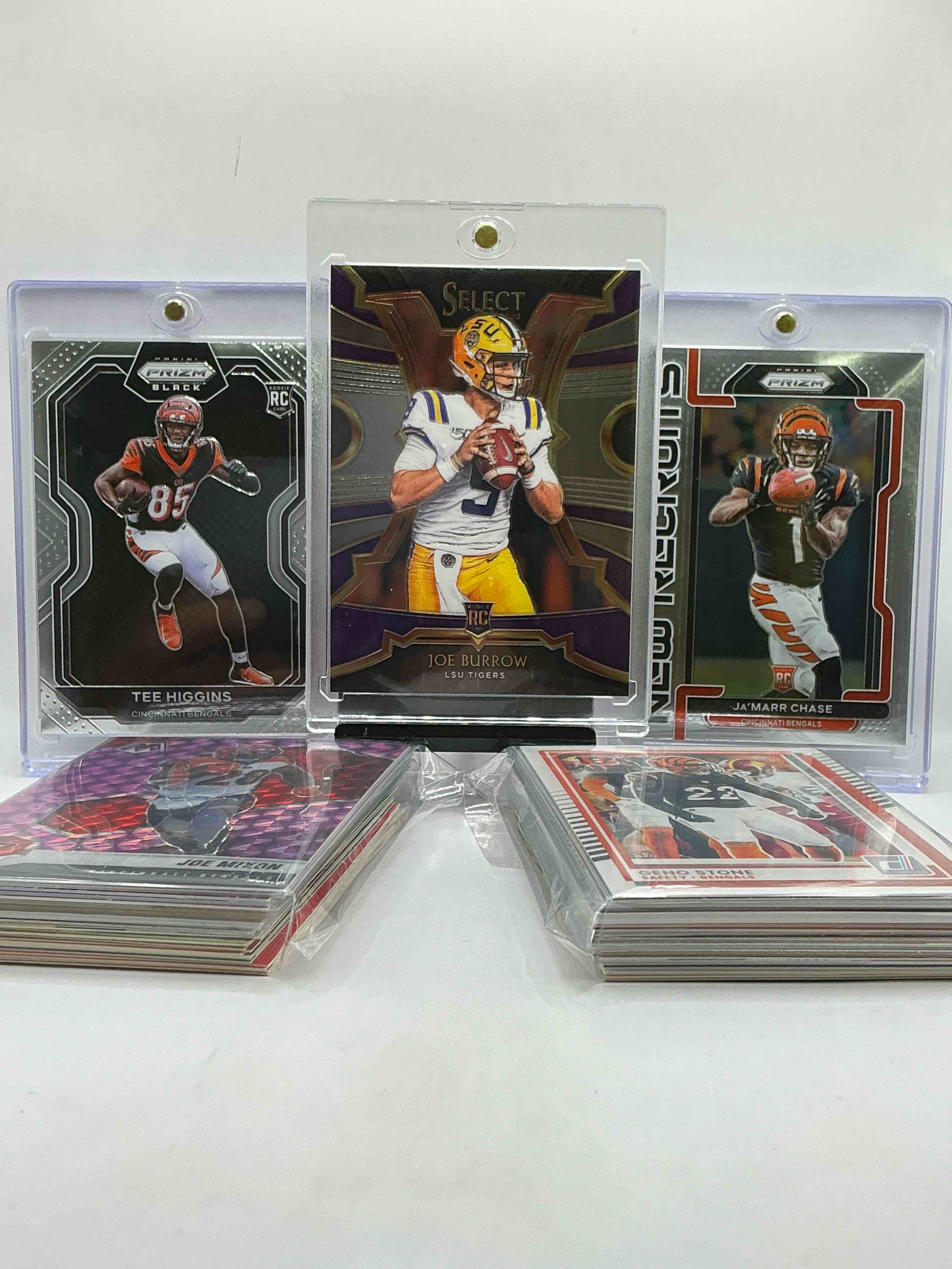 joe burrow select rookie, tee higgins prizm black rookie & ja’marr chase prizm rookie! insane trio! bengal bonanza! filled with legends, heroes, vintage & new!