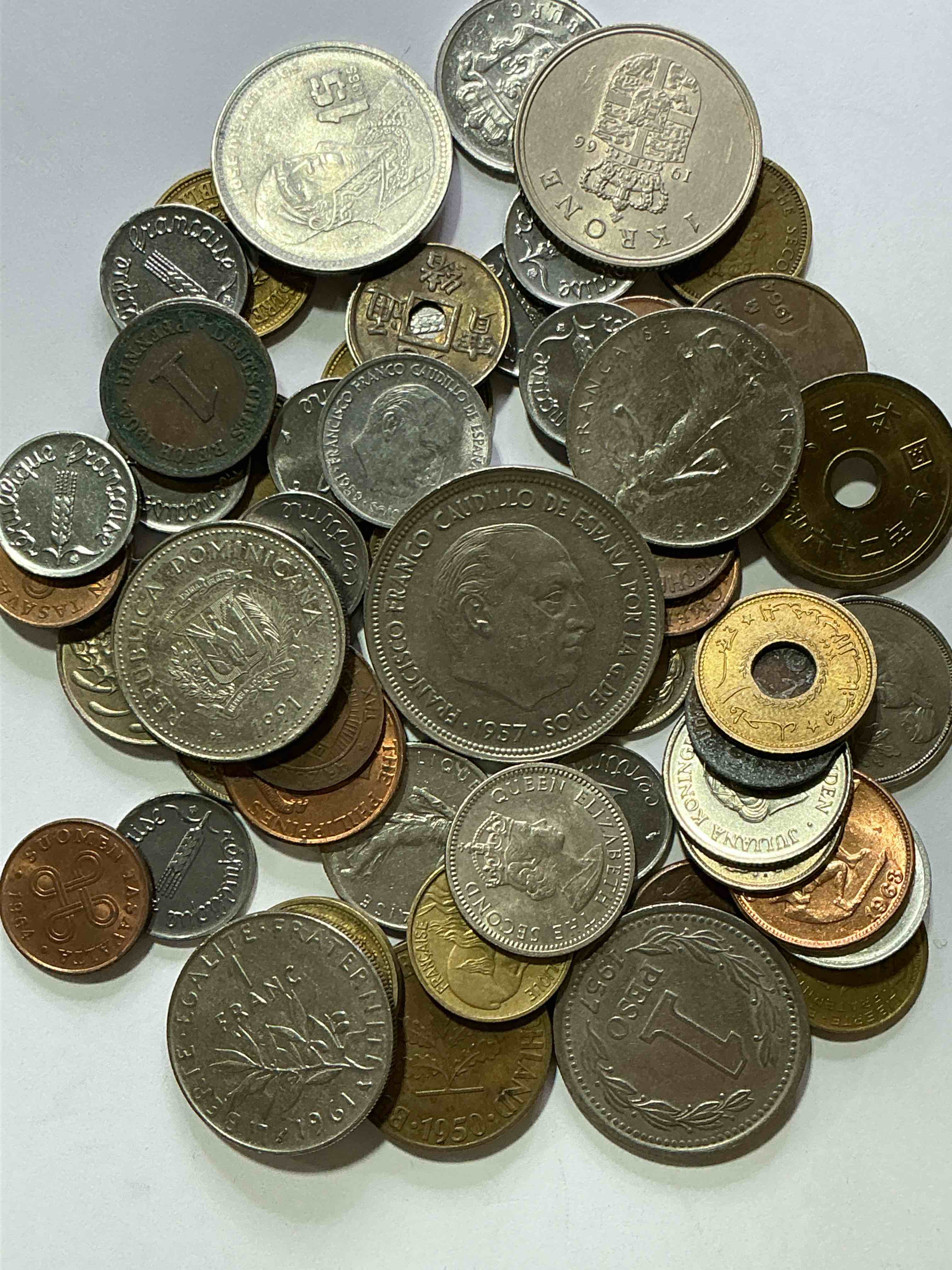 Condition photo showing Good Condition for world coins, antique & vintage! each lot is unique! many different years, countries, sizes & exotic places. this cool collection of antique coins from around the world is loads of fun! have fun identifying each coin & country as a great educational tool! a great investment too!