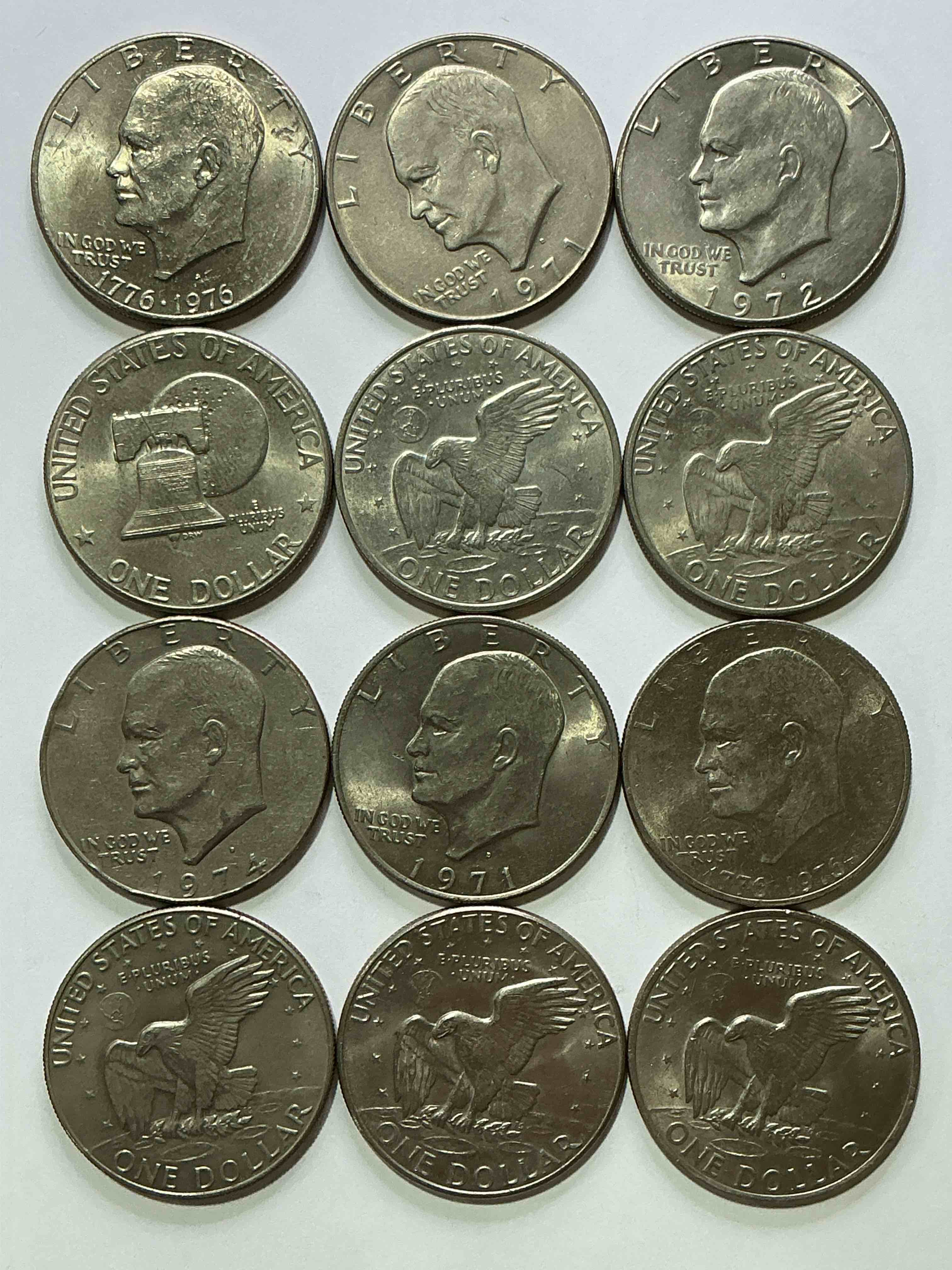 Condition photo showing Good Condition for gorgeous eisenhower dollar coins! these striking, large u.s. coins were minted from 1971-1978. here are gorgeous examples of “ike" dollars from 1976 & other years! these coins have become immensely popular with collectors & some have great toning!