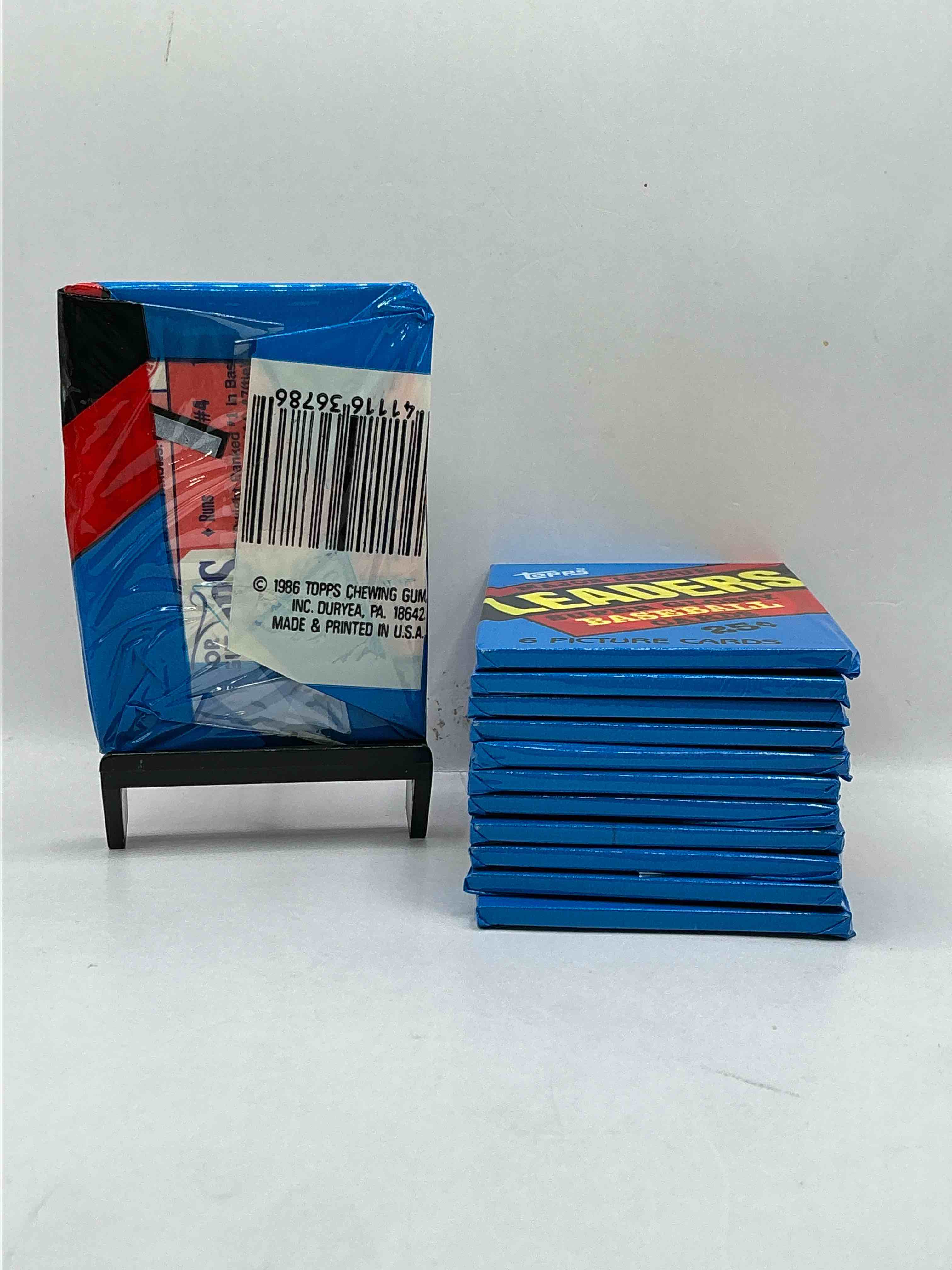 Condition photo showing New/Like New for ultra rare! 1986 "mlb leaders" unopened miniature baseball collectible card packs, 6 cards per pack, direct from original retail case. super rare, impossible to find! like new condition!