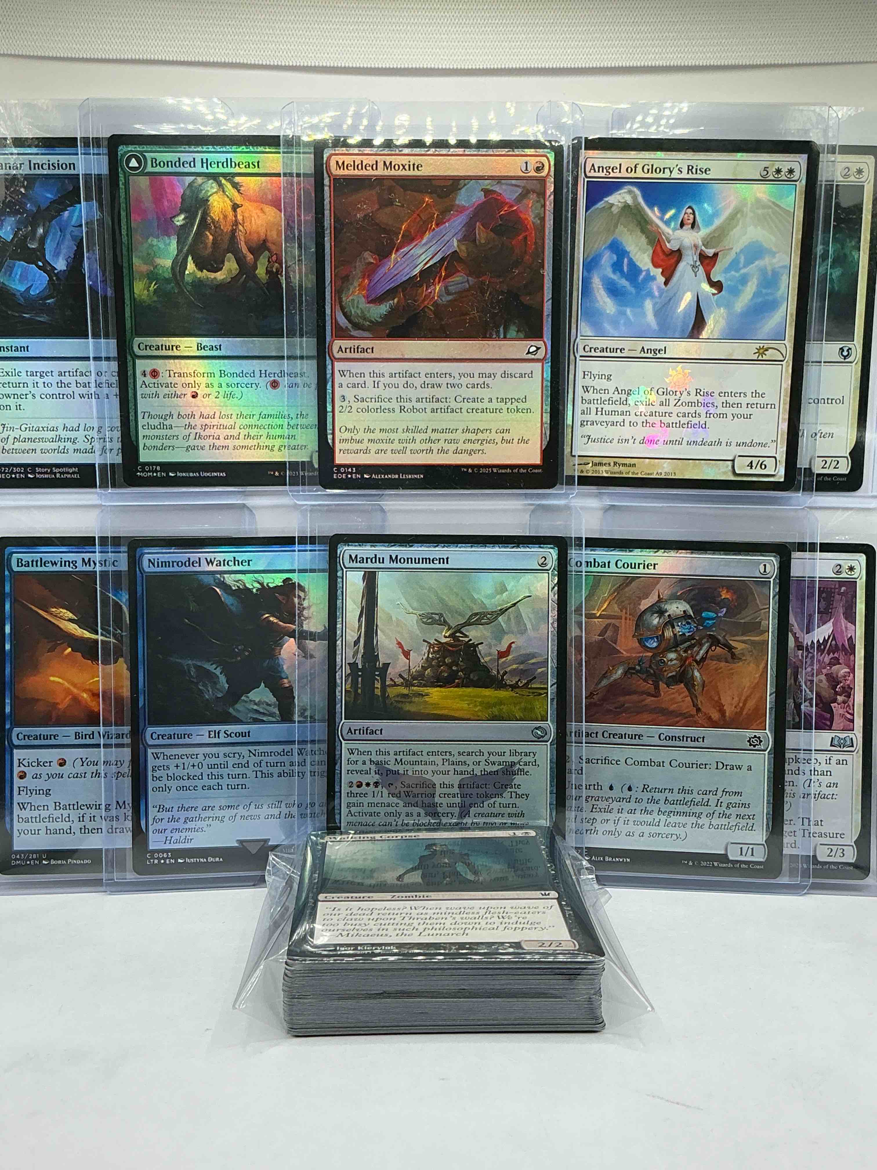 Condition photo showing New/Like New for magic the gathering 50 card lot! lot includes 10 rare or holo foil cards! all cards in excellent shape condition! a great way to join the mtg craze!