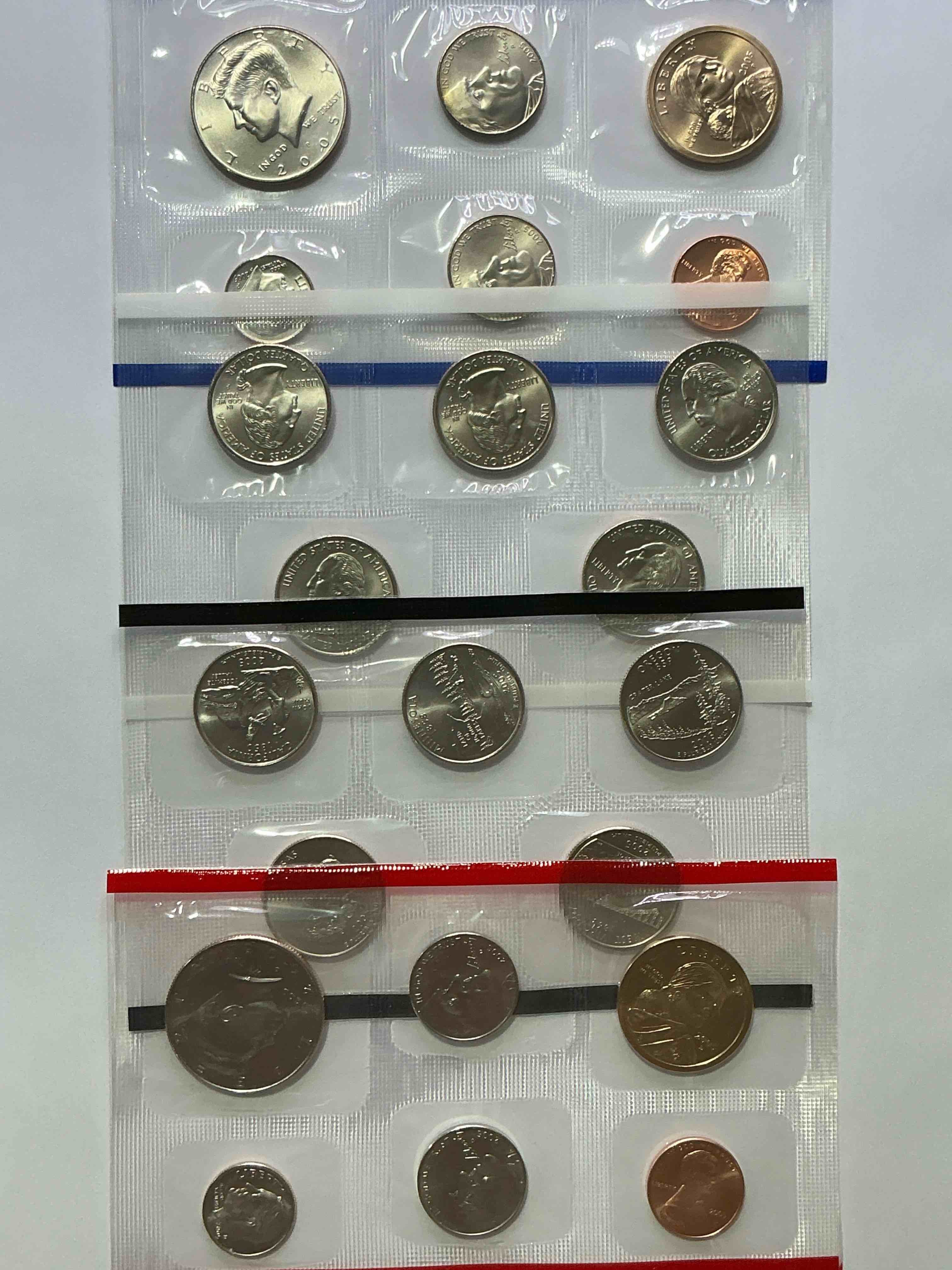 2005 uncirculated mint coins! 20 coins from philadelphia & denver! 20 coin uncirculated lot, with state quarters, nickels, half dollars, dimes, pennies & more! uncirculated coin craziness!