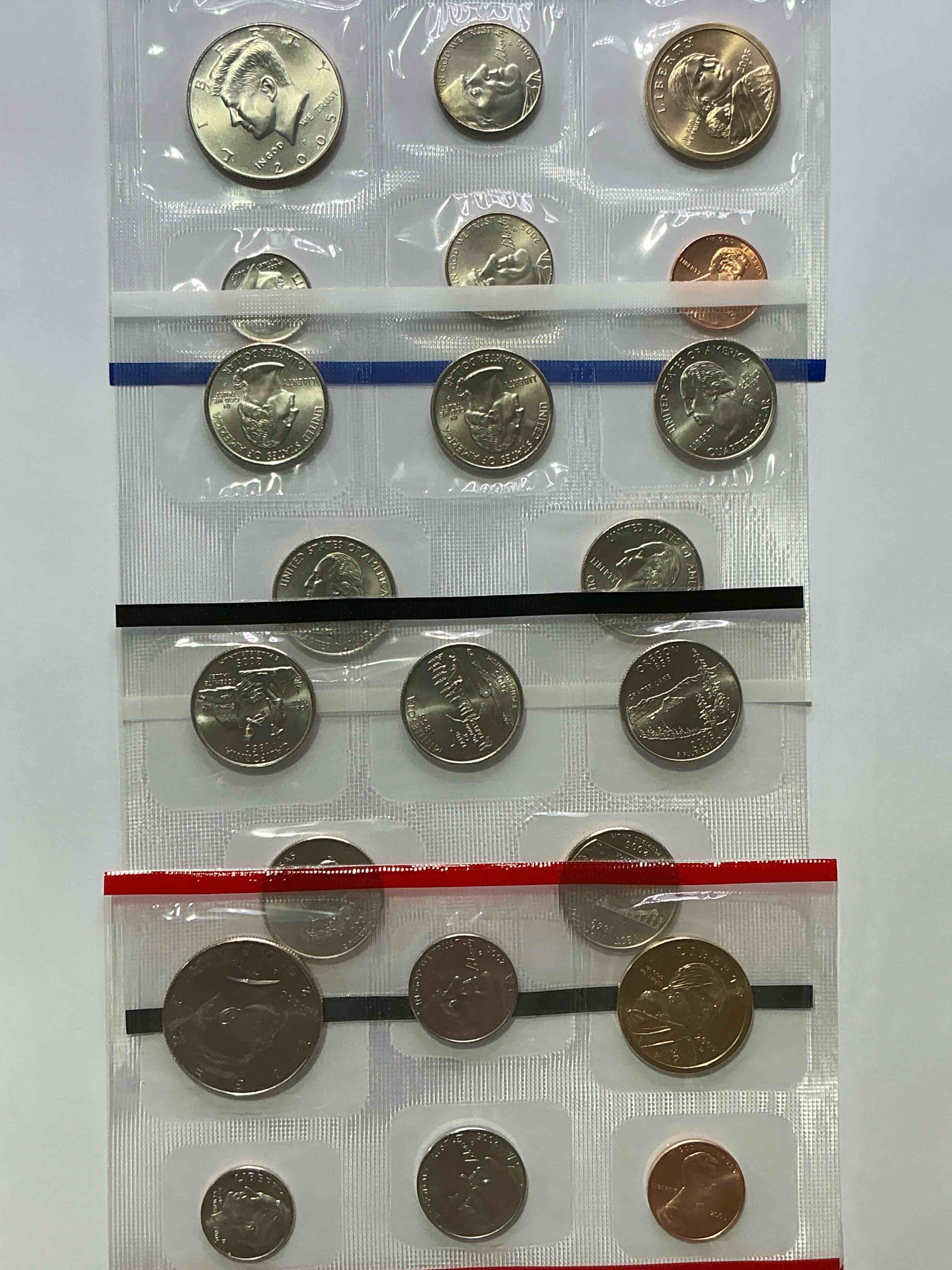 Condition photo showing New/Like New for 2005 uncirculated mint coins! 20 coins from philadelphia & denver! 20 coin uncirculated lot, with state quarters, nickels, half dollars, dimes, pennies & more! uncirculated coin craziness!