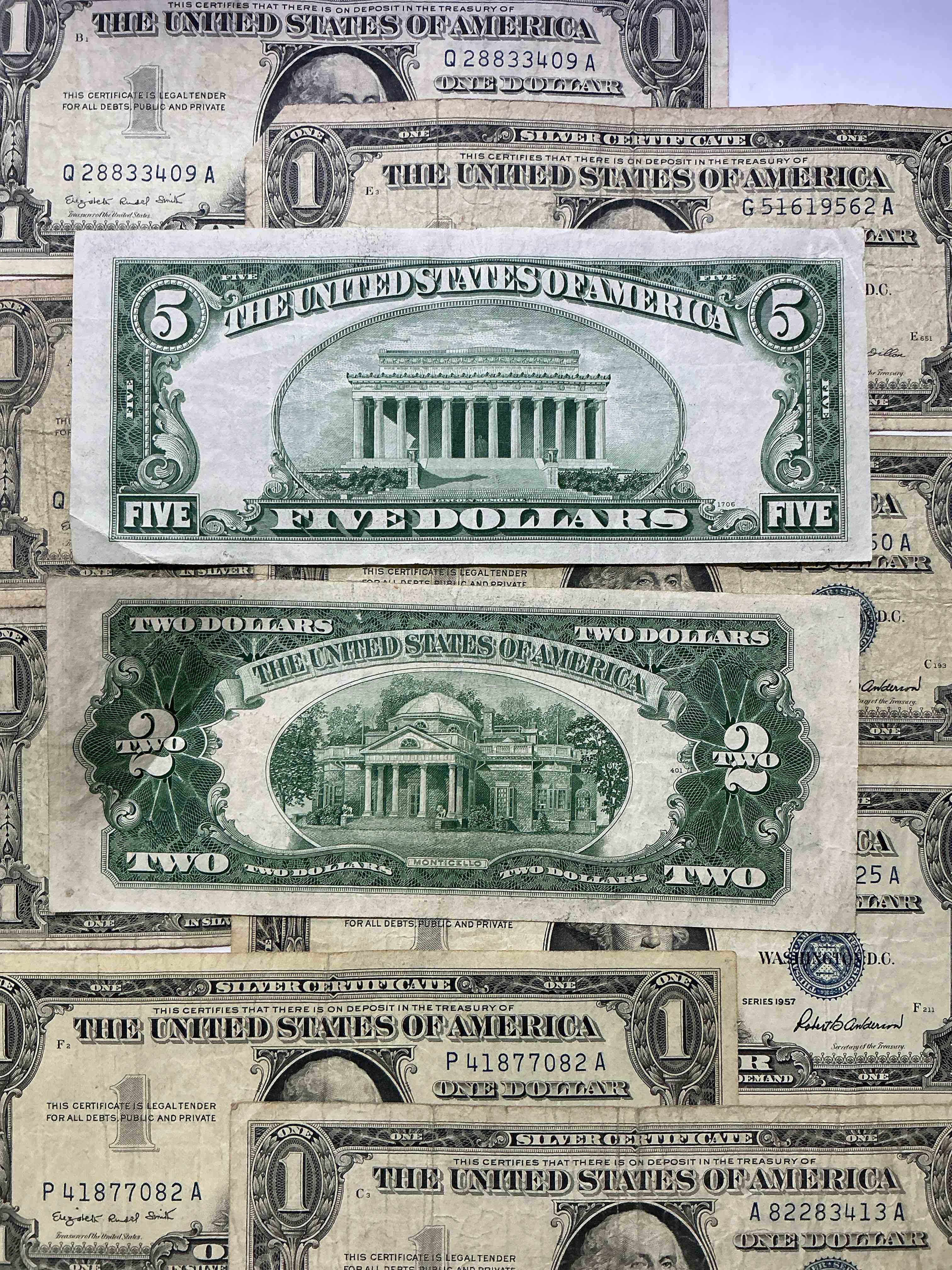 Condition photo showing Good Condition for rare american dollar bills! blue seal five dollar bill & red seal two dollar bill, along with silver certificates! five dollar bill ultra rare & in good condition, red seal two dollar bill in good condition & silver certificates produced from 1878 to 1964 & are still considered legal tender at face value. here are gorgeous, circulated 1935 & 1957 u.s. one dollar silver certificate, with highly collectible "blue seal!* own an awesome piece of history! american dollar lot! 