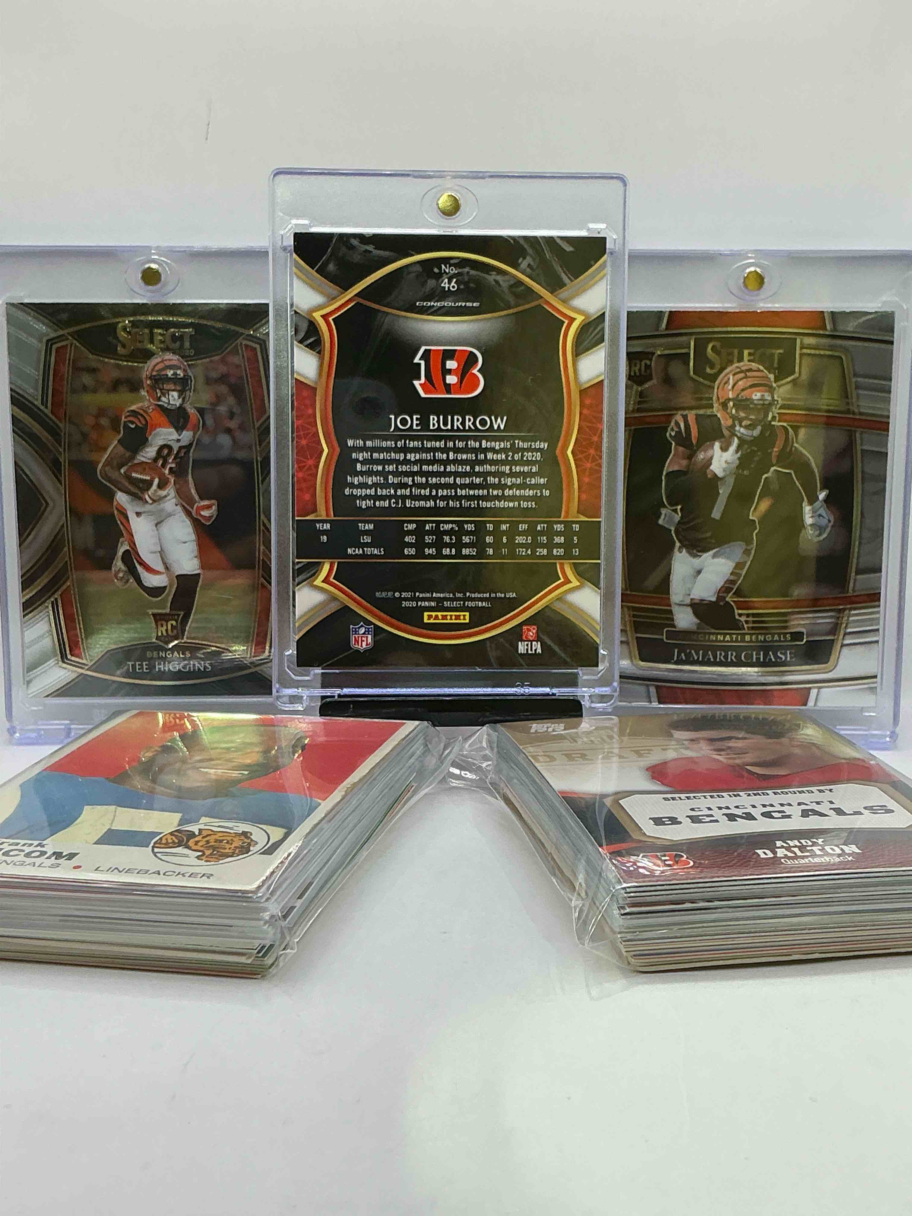 Condition photo showing New/Like New for joe burrow, ja’marr chase & tee higgins select rookies! bengals trio! 50 card lot includes commons, legends, rookies & more! cincy craziness! vintage & new bengals!