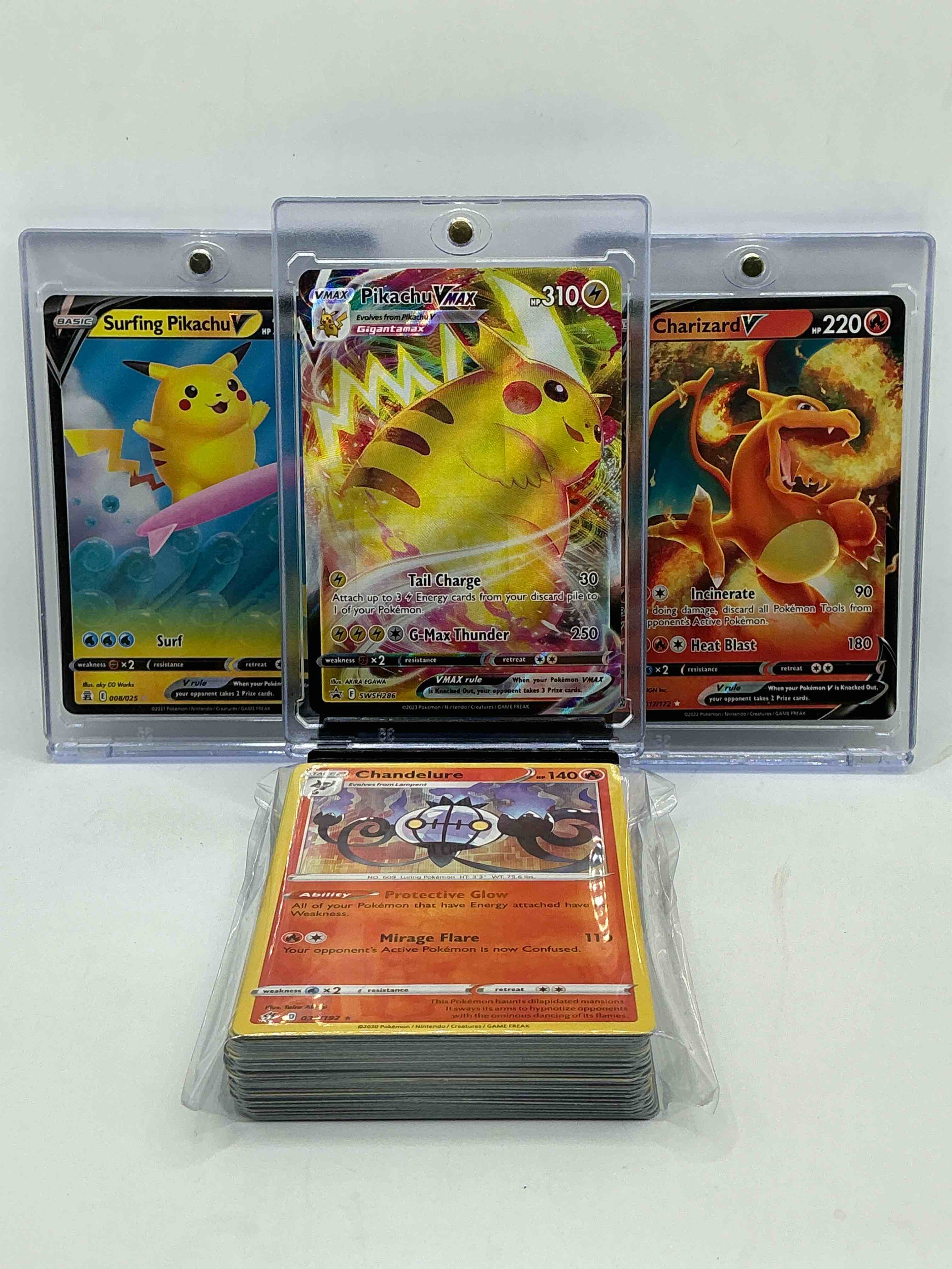 Pokémon Palooza! Flying Pikachu VMax! Charizard V! Surfing Pikachu V! Along With 50 Other Pokémon Heroes, Holos, Legends & Commons- Including Holographic Cards, Stage 2 Cards, Holos In All Forms & More! Also Includes 36 Non Holo Common/ Uncommon Basic & First Stage Cards Trainers & Energy Too! Perfect Set For Collectors & Enthusiasts!