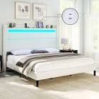 Upholstered twin platform bed frame with wind back headboard LED lights white