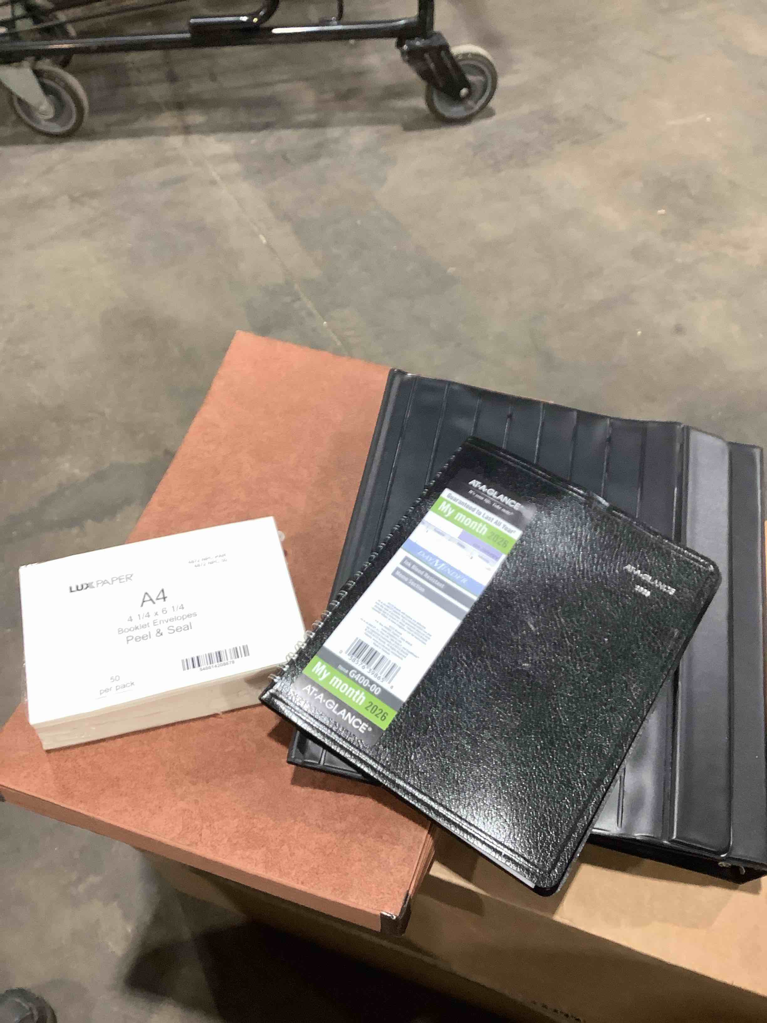 Assorted office supplies; at a glance my month 2026, booklet envelopes, peel and seal, black ring binder