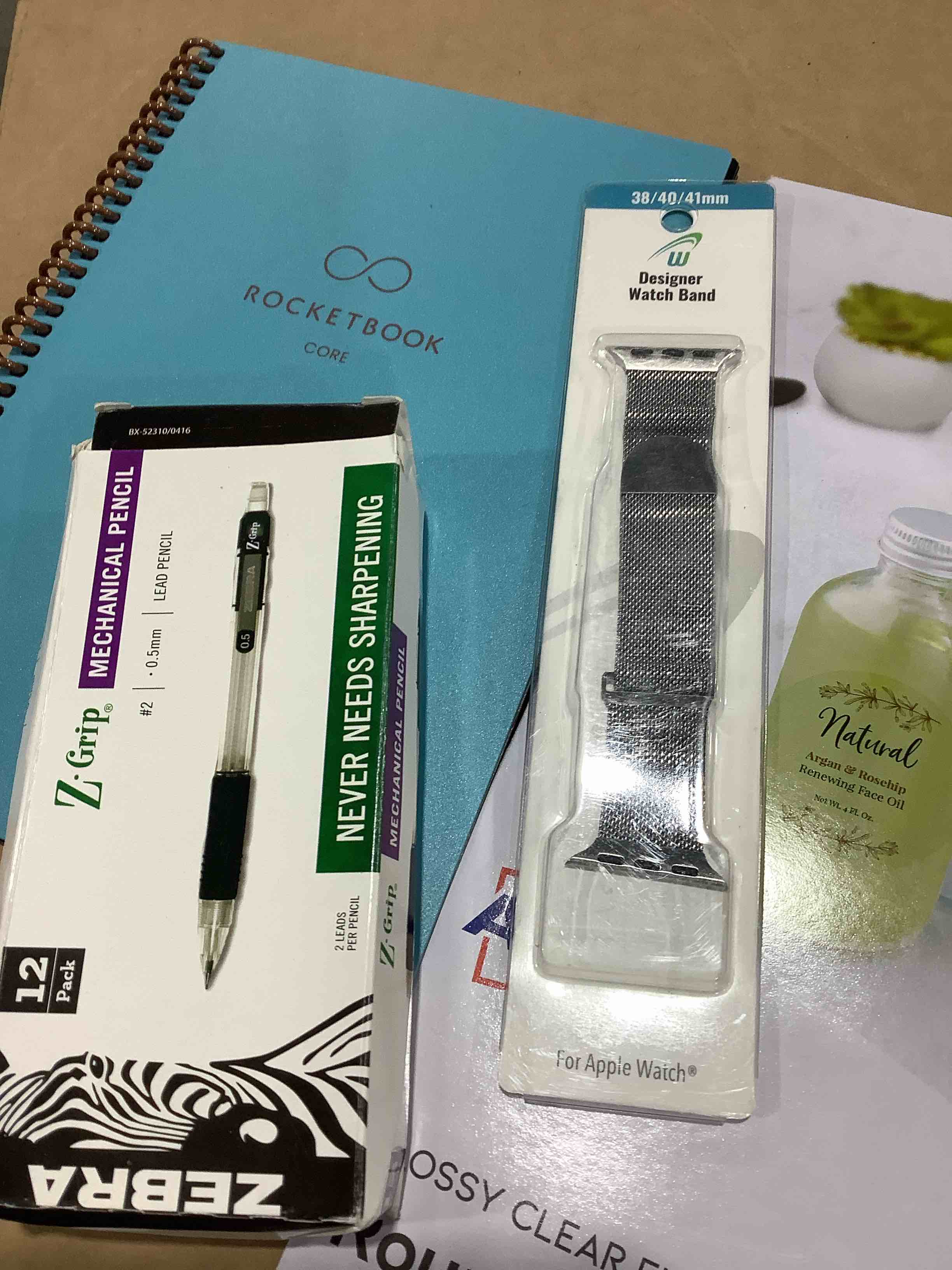 Condition photo showing Good Condition for Assortment of this and that: designer watchband, zebra 12 pack, black pens, rocket book core, round label 2 inches