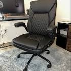 Marama Ergonomic leather office chair with flip up armrests, black