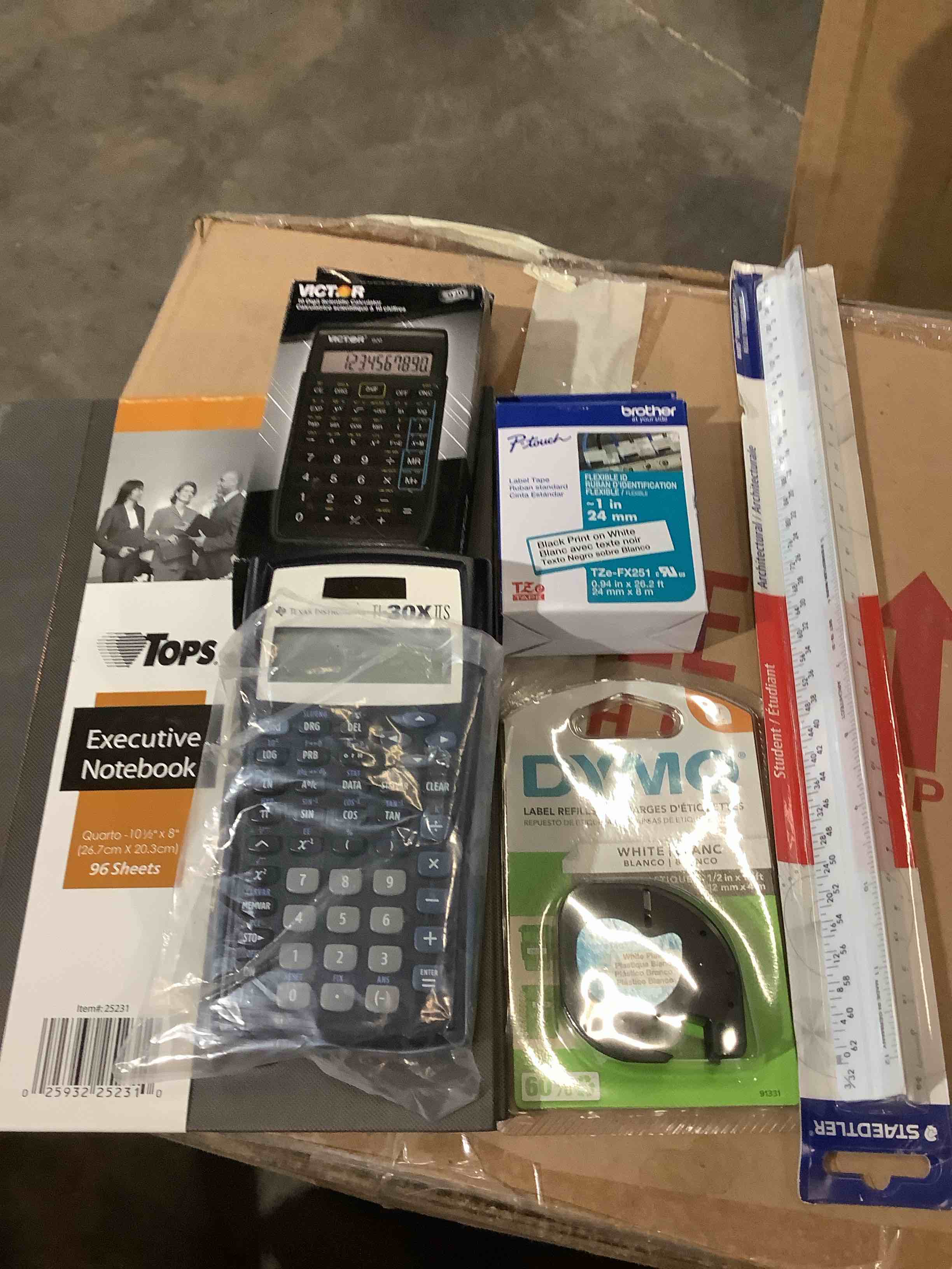 Office supplies assorted: to executive notebook, Victor Texas, instrument calculator, dymo white black, executive notebook,