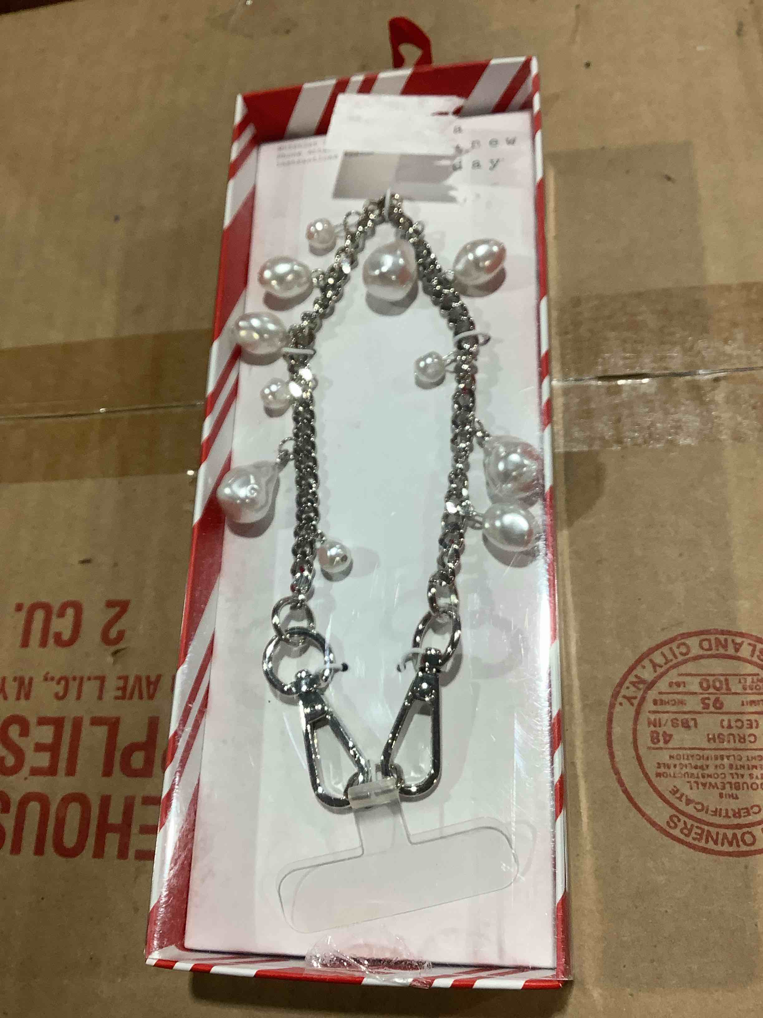 A new day wristlet strap phone attachment included