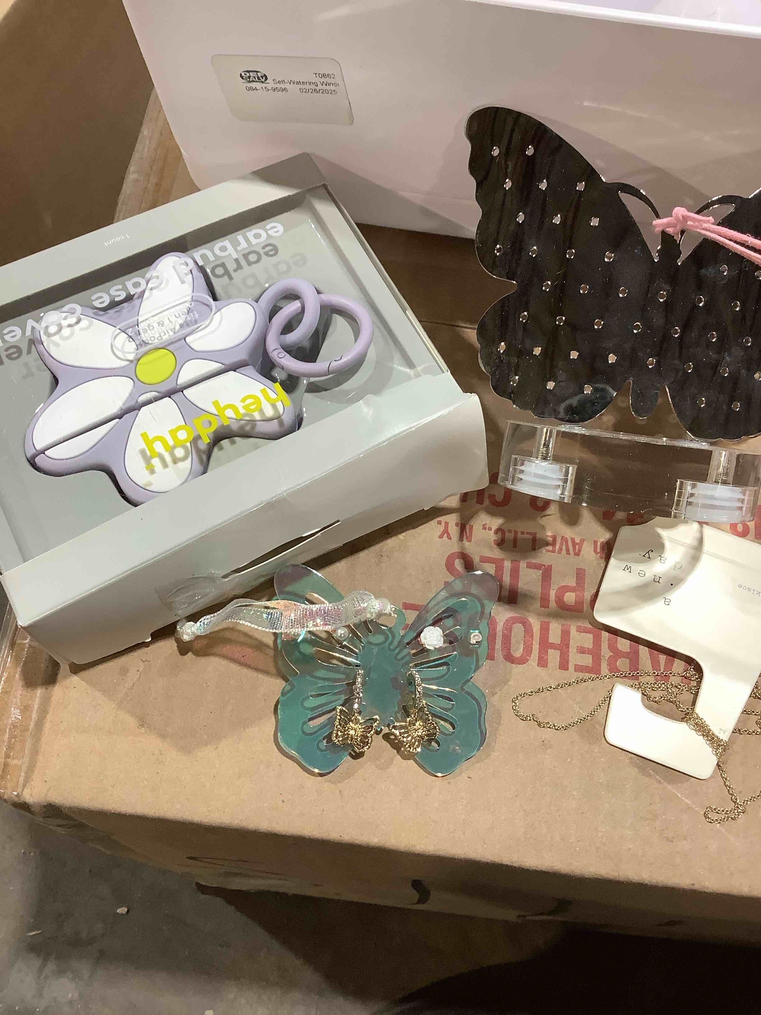 Condition photo showing Good Condition for Assortment of this, and that: planter, hey there earplug case cover, charms, jewelry and more