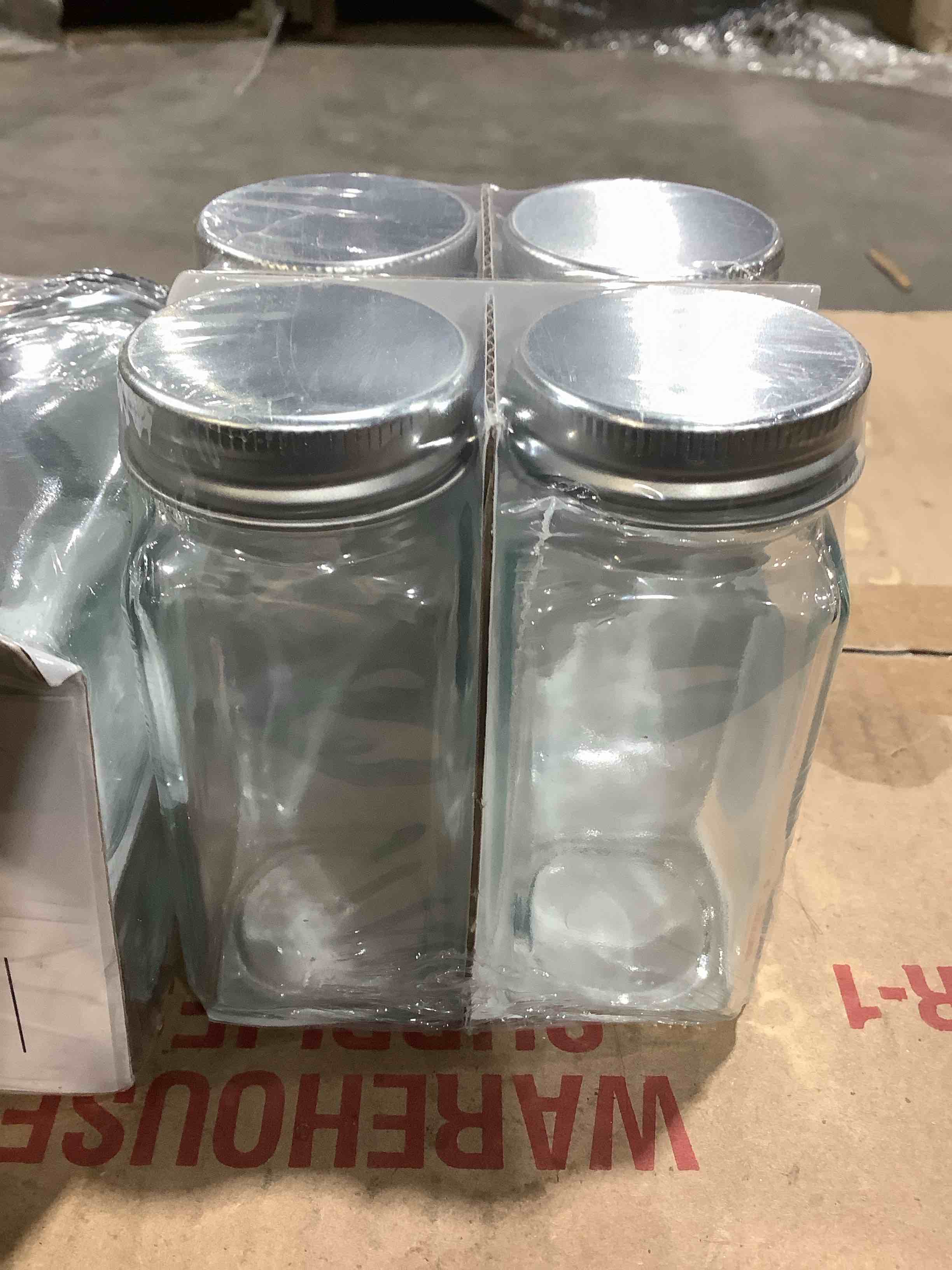 Of four spice jars includes stickers