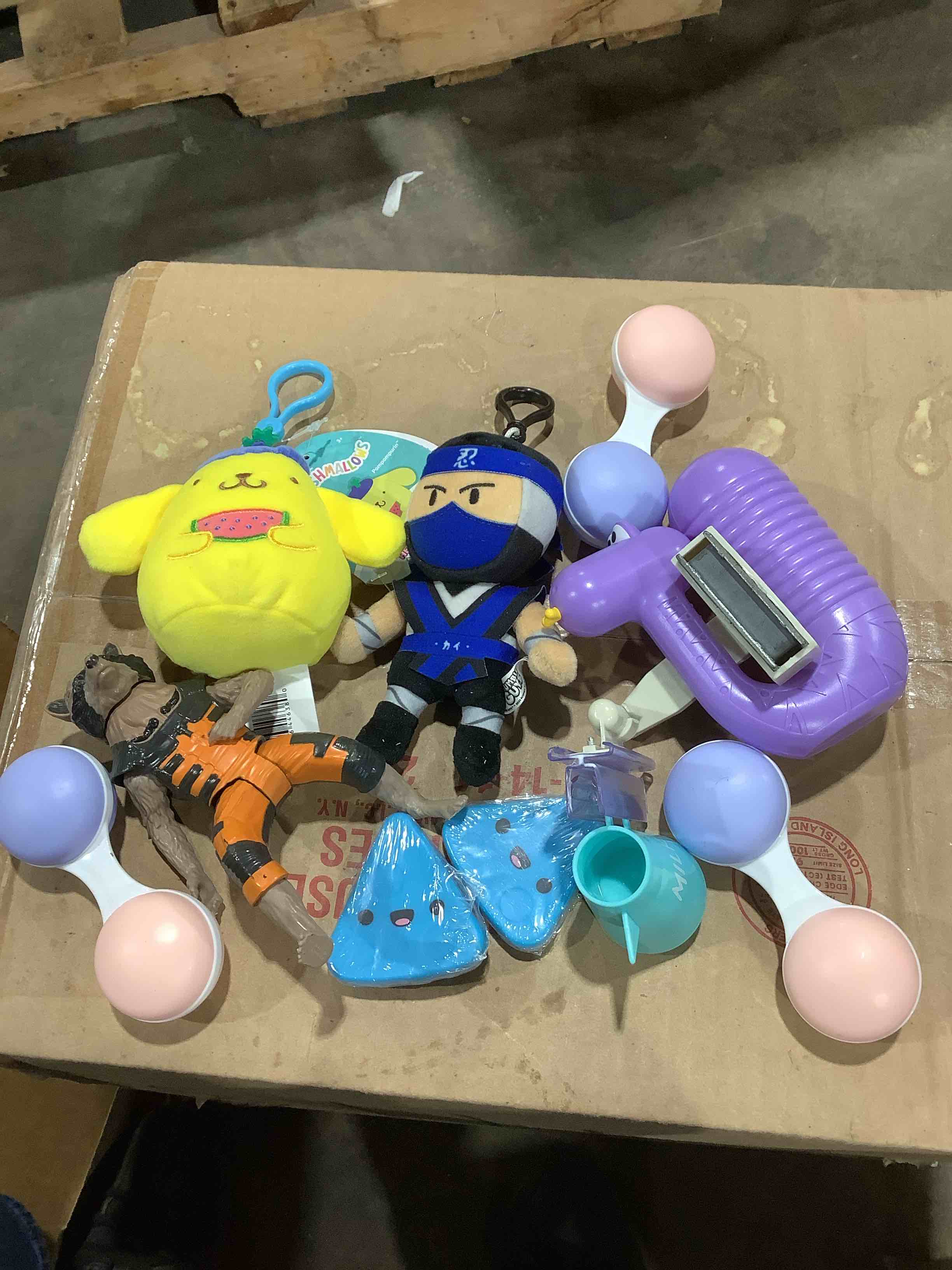 Assorted toys, ninja, marshmallow, rattles and more