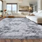 Glendine Faux Sheepkin 9' Area Rug with non-slip backing, light blue
