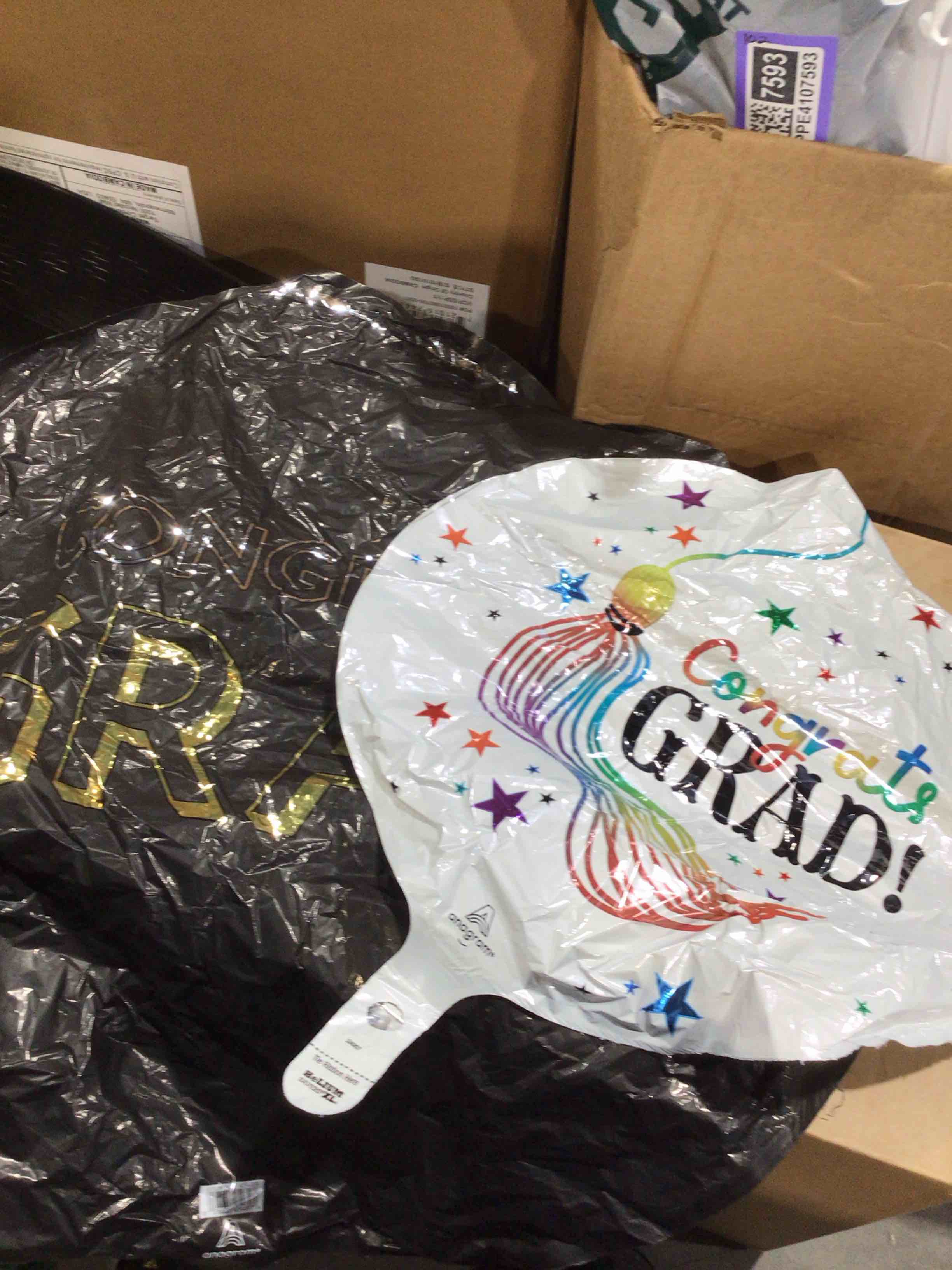 bag full of assorted inflatable balloons for various events